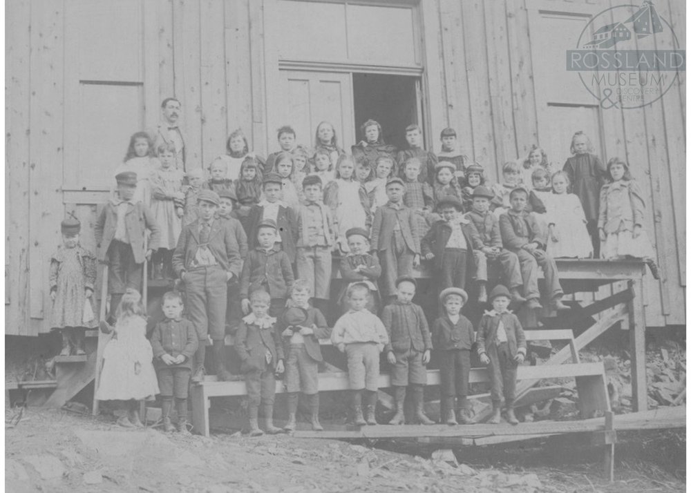   2276.0405 : The first school in Rossland, located in the Methodist Church, 1895.  D.D. Birks, Rossland’s first teacher, is located on the upper left of the image. 