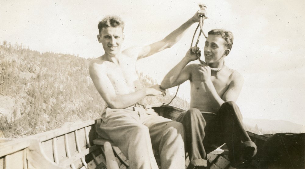  2341.0280: Joe McDonell (Left) and Jimmy Harper (Right) having fun in a row-boat on Christina Lake, September 1933. 