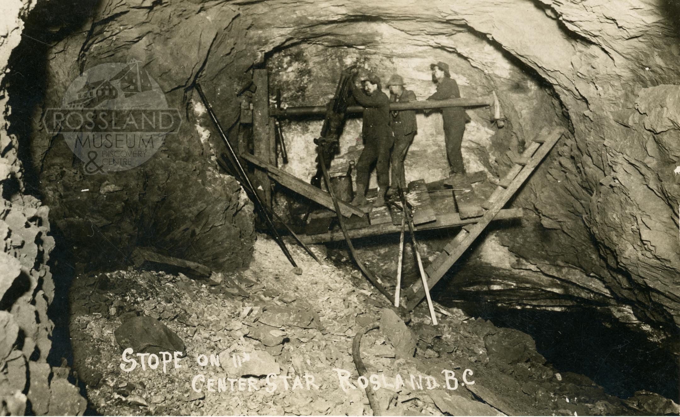 Photo 2304.0061: Drilling in a stope on the 11th level of Centre Star Mine, circa 1907