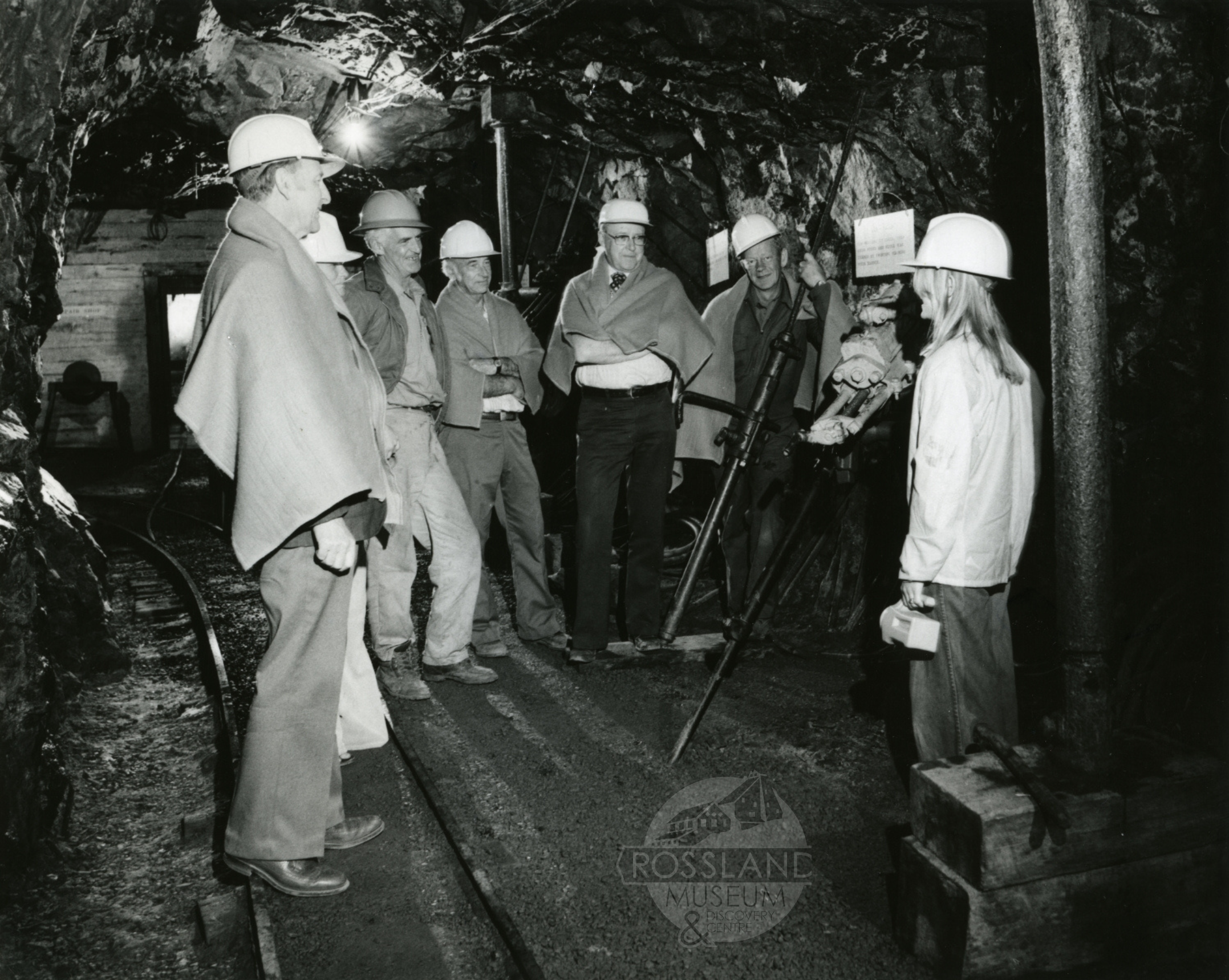 2276.0248: Group underground at the Rossland Museum: Jack McDonald, Mavis Mitchell, Roger Terhune, Jack Page, Art Howard, Haran Smith, and tour guide Carmen Gidson, circa 1978