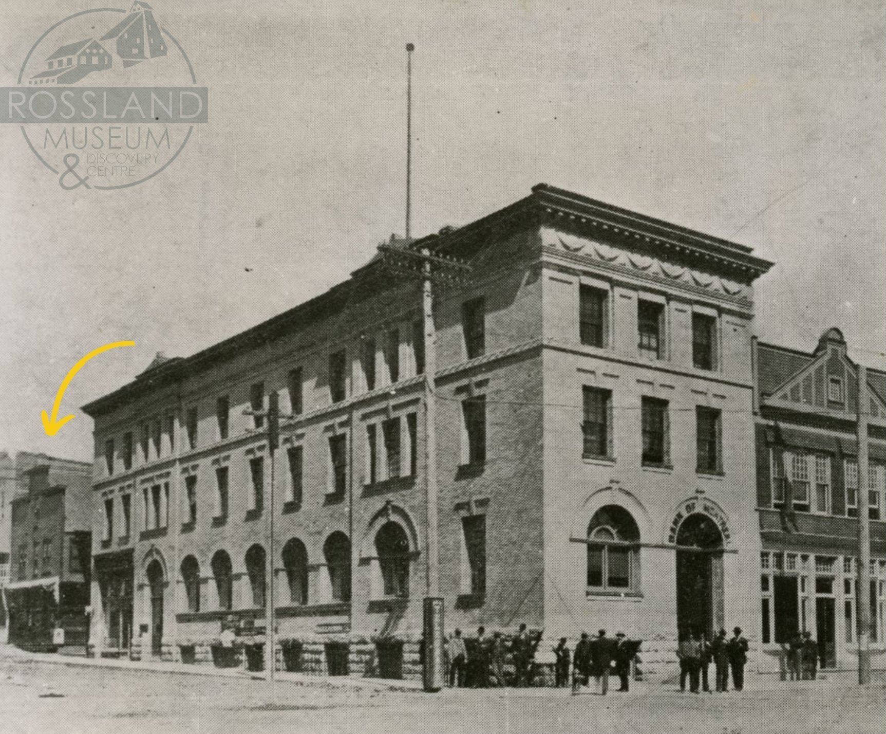  2356.0065: Corner of Washington Street and Columbia Avenue, showing the Bank of Montreal and Hotel Collins (arrow). 