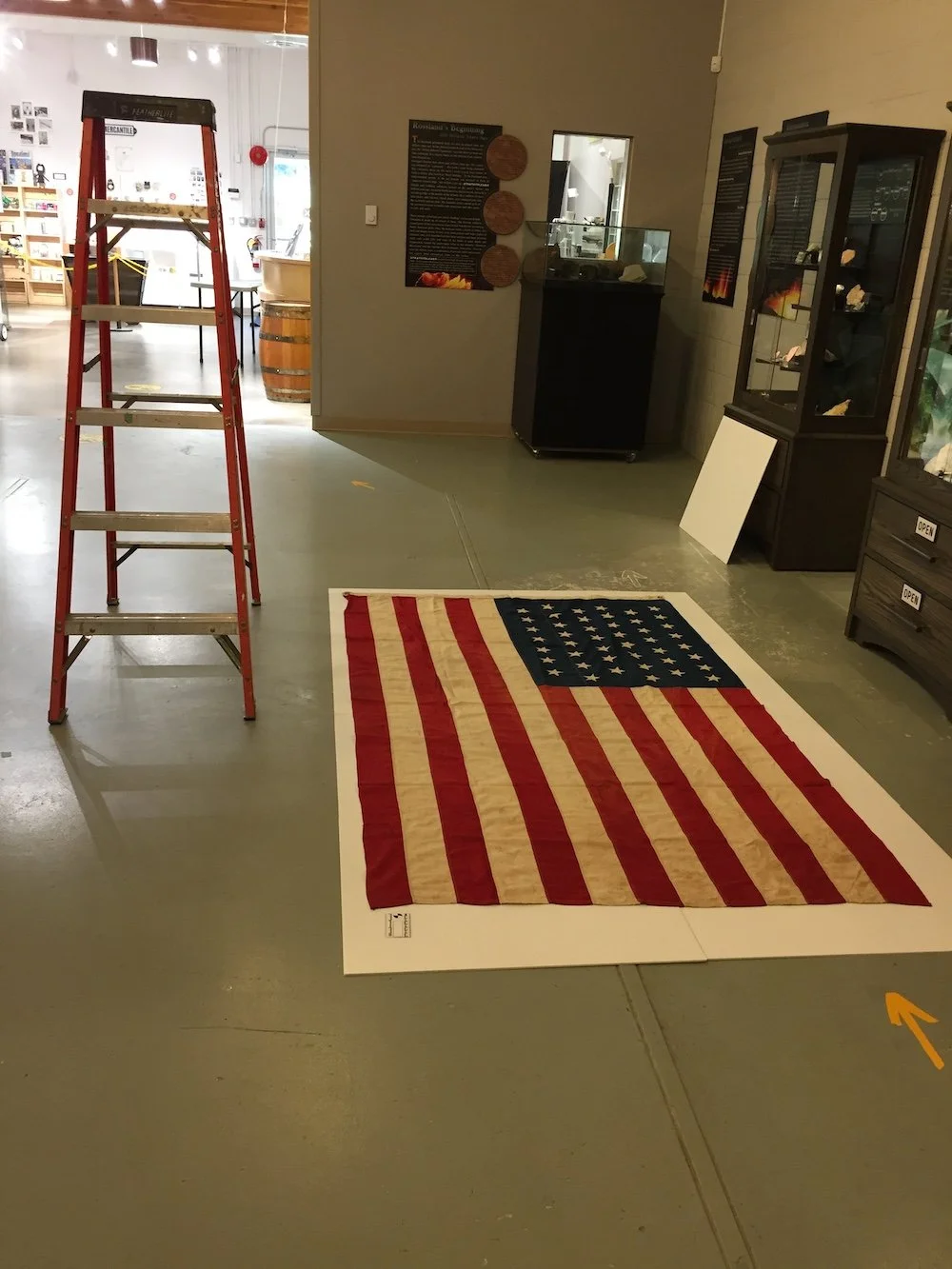 Photographing our large flags often means taking over the main gallery and a ladder! 2021