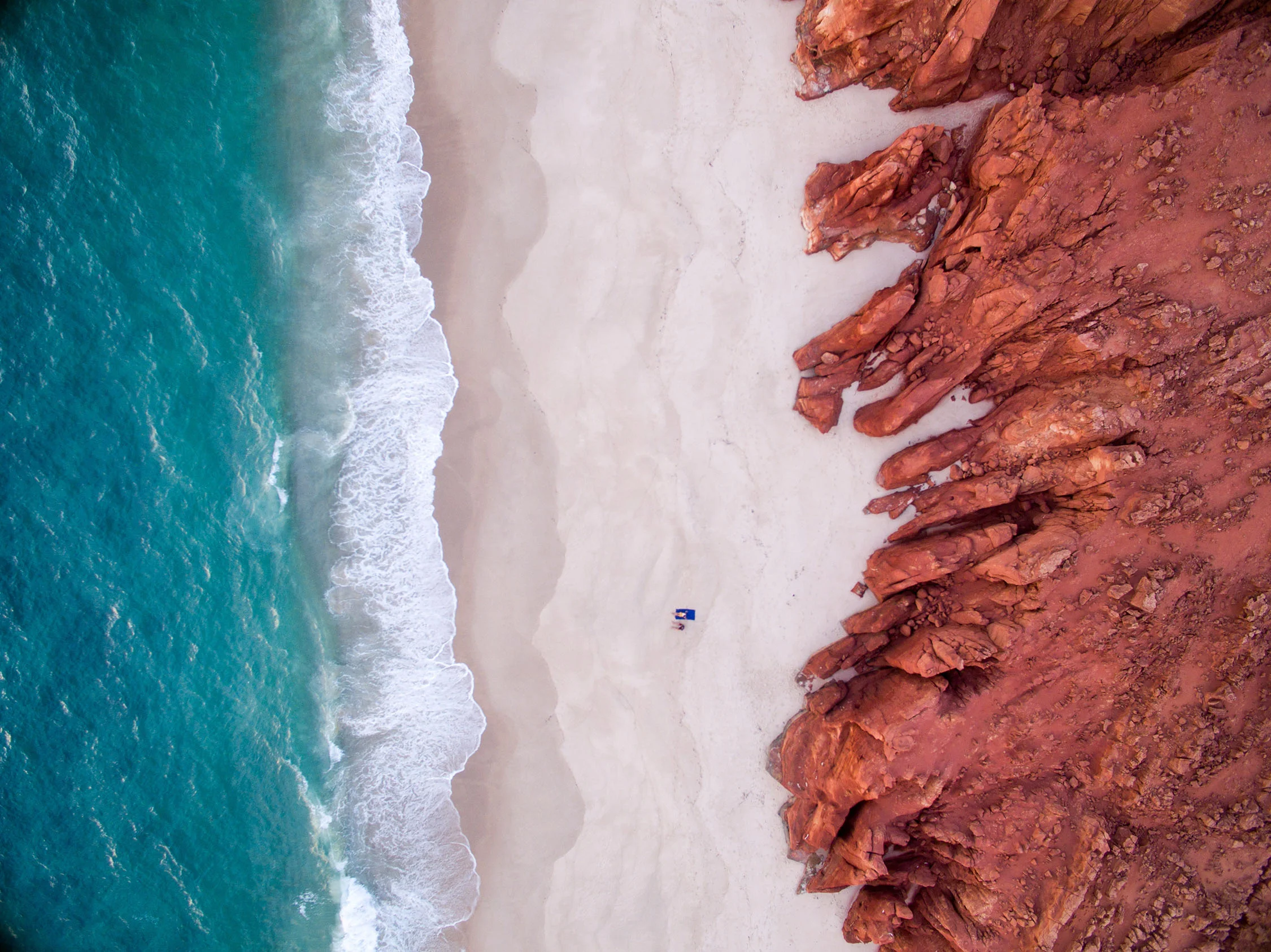 “Cape Leveque, WA, where white-sand beaches are bound by red cliffs and blue water.” Image by Places We Swim