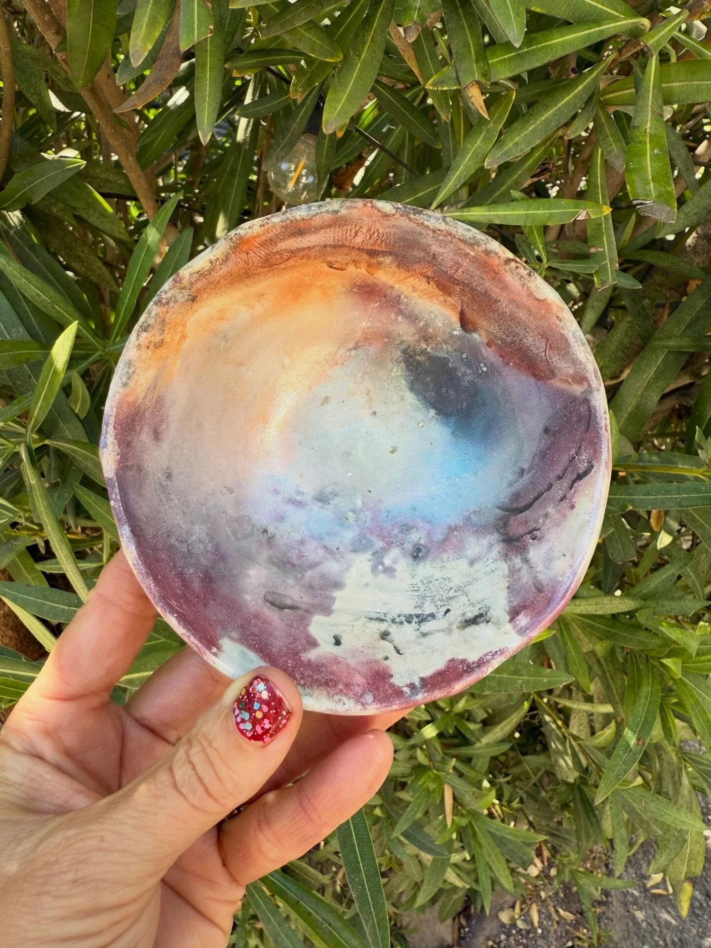 There&rsquo;s something magical about pit firing! 🔥 Each piece emerges from the flames with its own unique story. This bowl was one of my fav pieces from our last firing, and is a perfect example: the earthy reds, smoky greys, and unexpected flashes