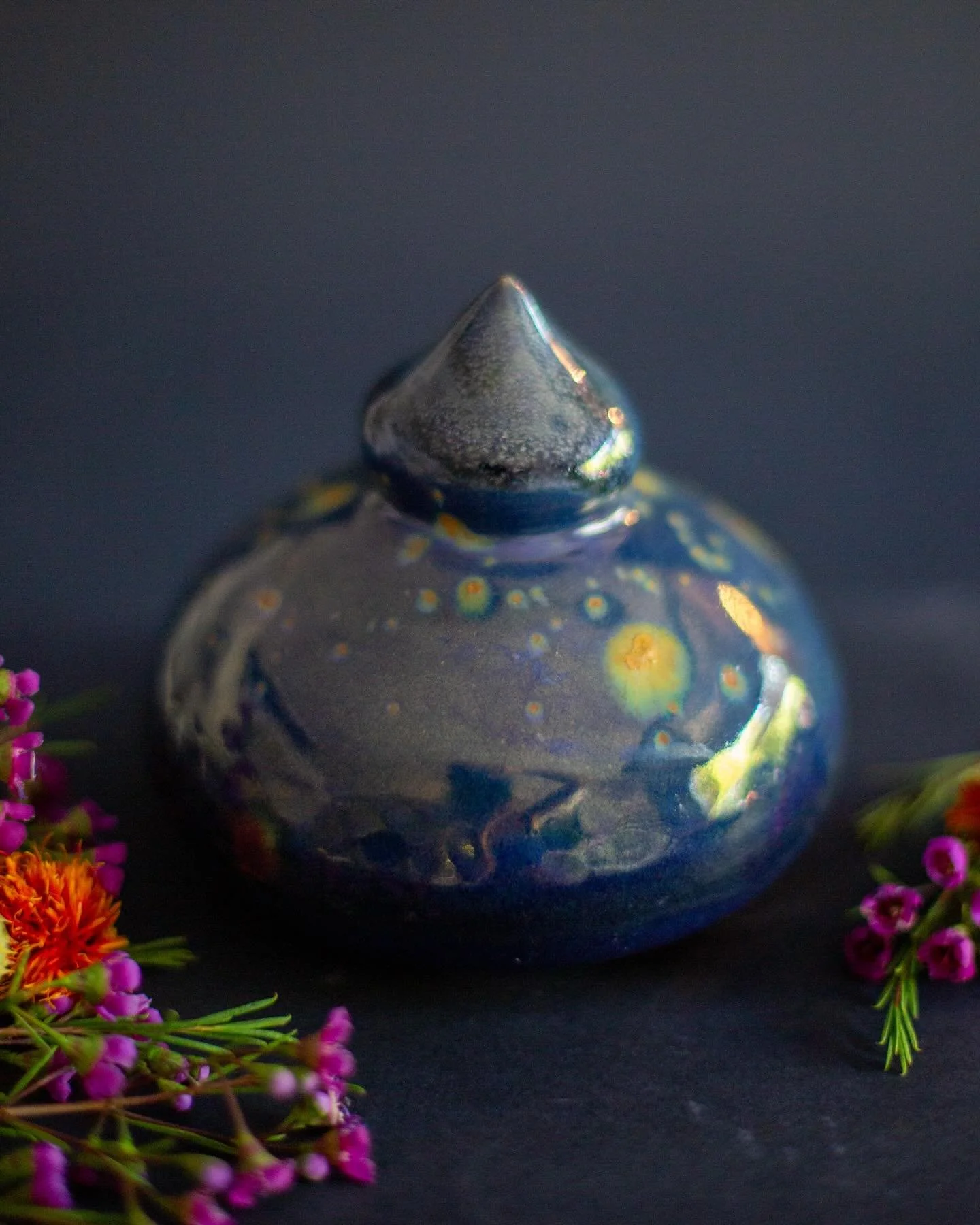 ✨ &lsquo;Celestial Bloom&rsquo; Luster Sculpture ✨

Handcrafted on the potter&rsquo;s wheel, this stoneware bulb sculpture is a one-of-a-kind artwork, finished with a creative application of my personally formulated luster glazes, and fired through a