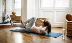GEAR+4+Ex+woman+elbow+to+knee.jpg