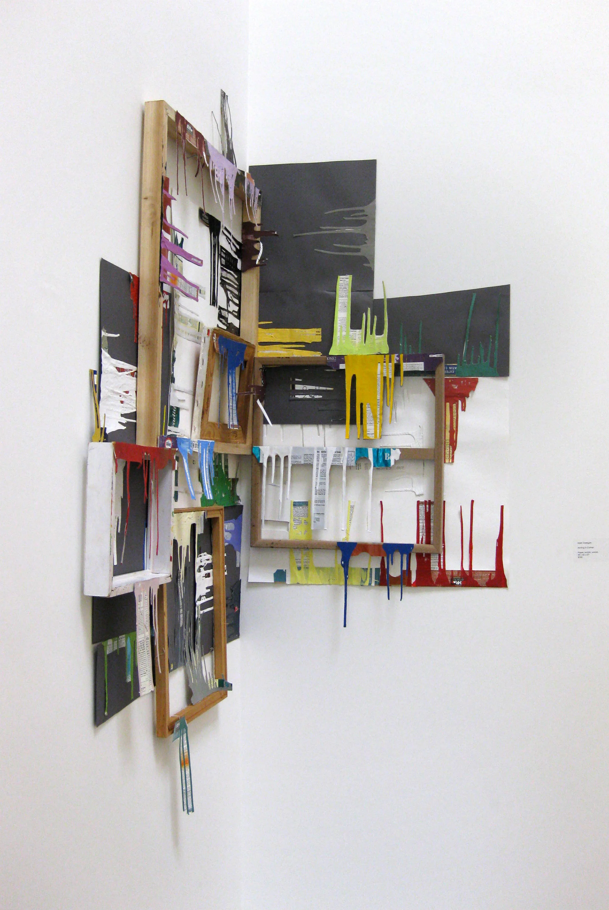 Ainting in Corner , extracted paintcan labels and drips, canvas stretchers and frames, tape, nails, dims vary, 2012