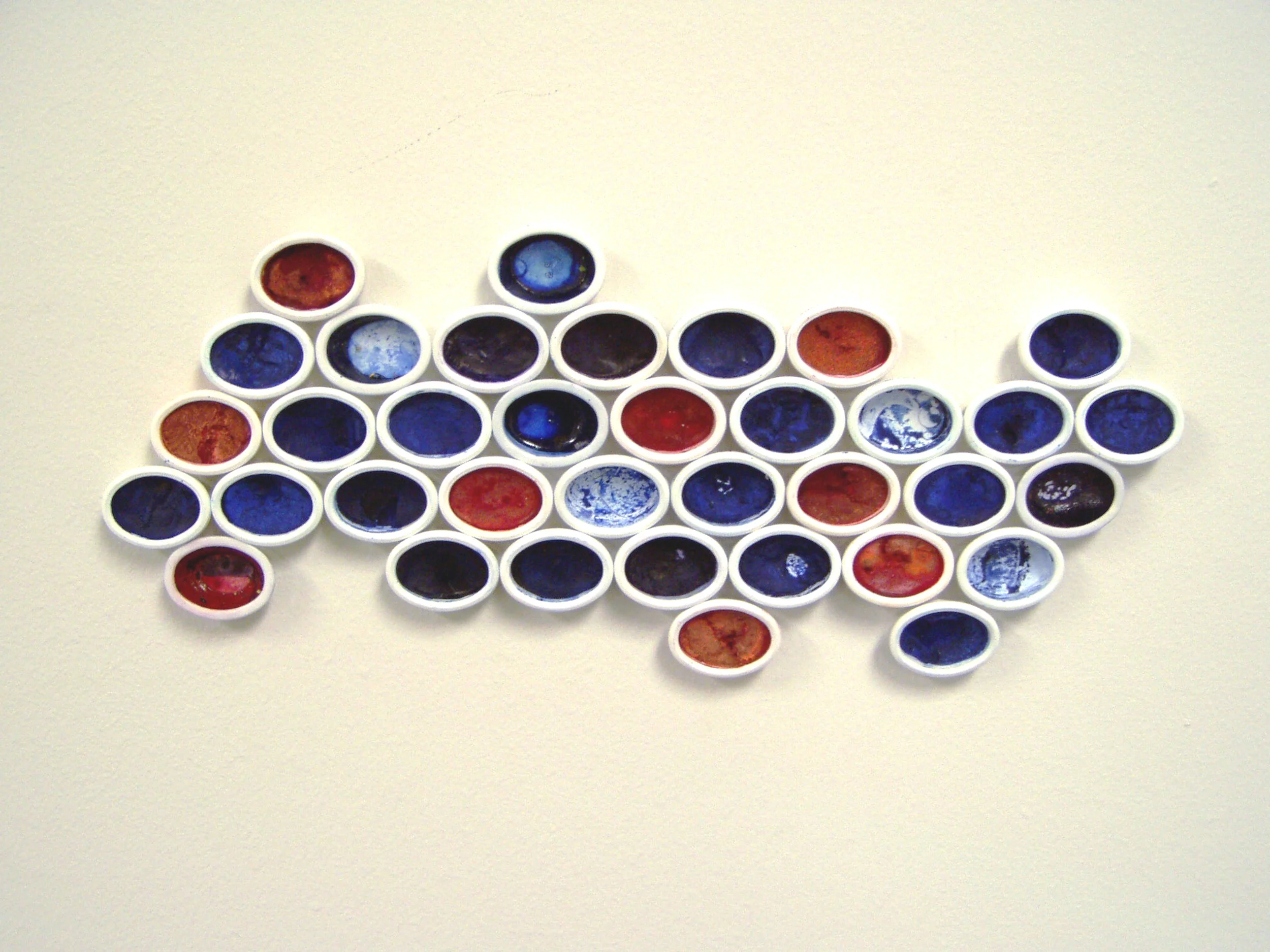 Watershed , used watercolor pans on wall, dims vary, 2005