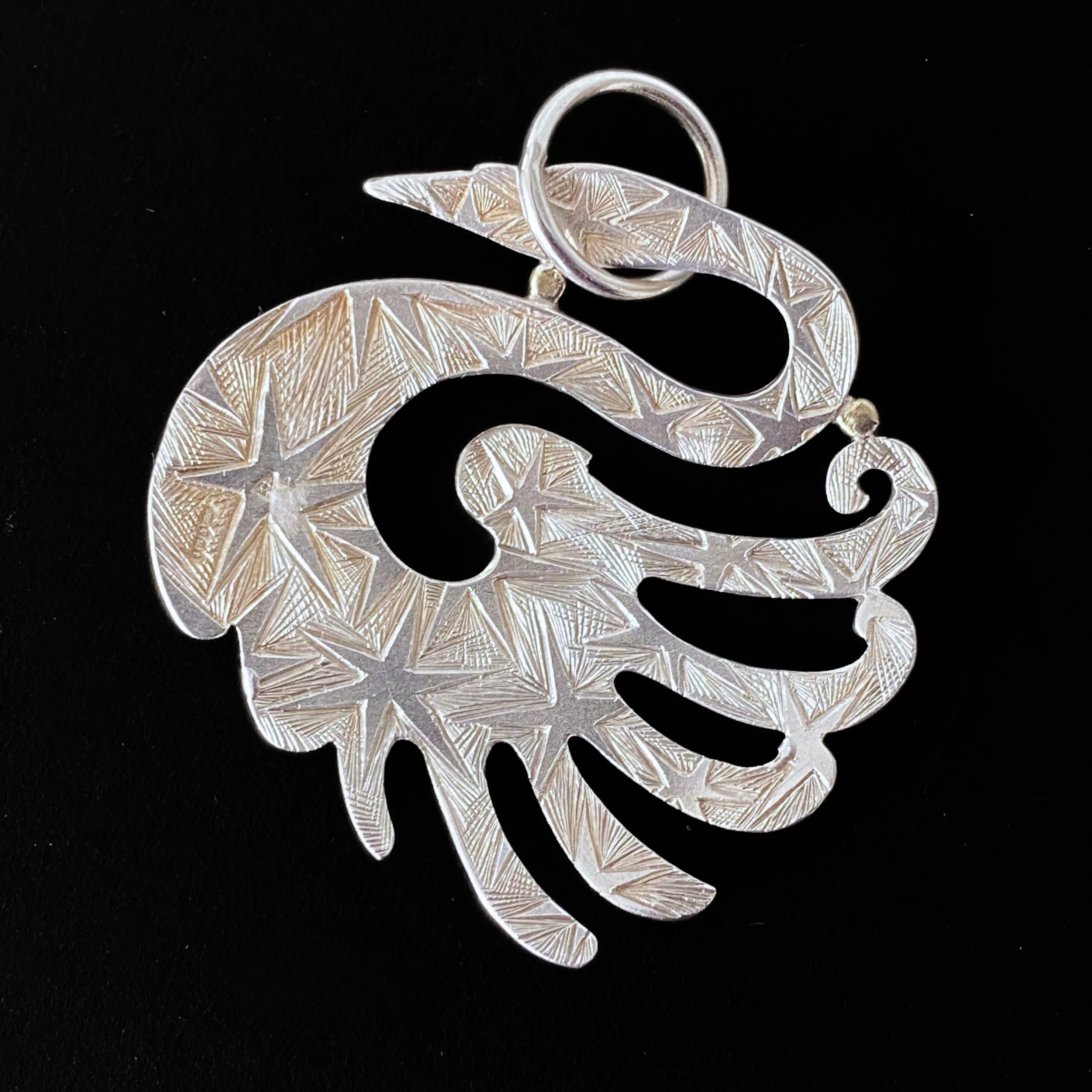 Malcolm Appleby - Swan and Stars Pendant (back) (1).jpg