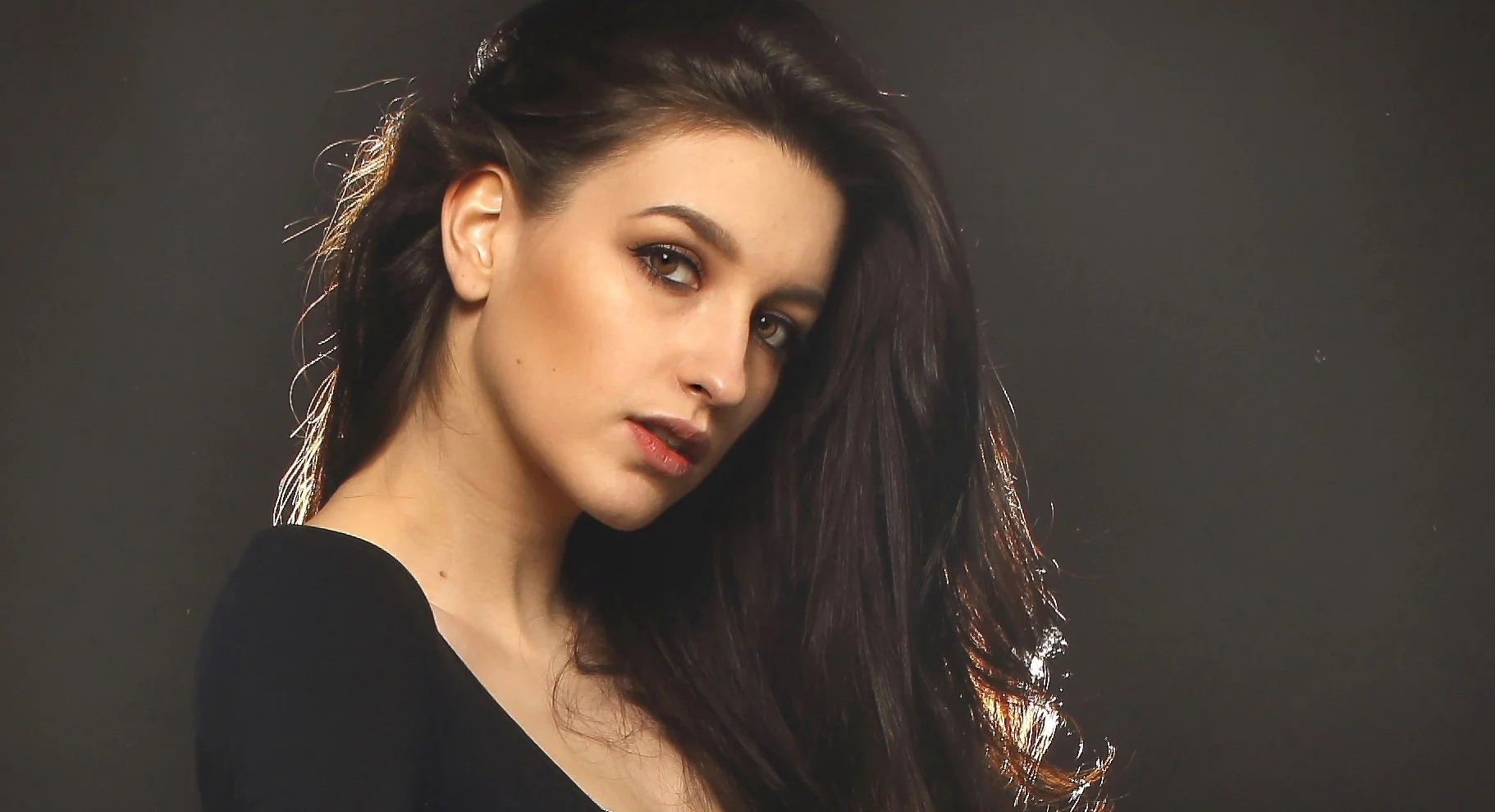 Studio Headshot_SQSP_flip.jpg