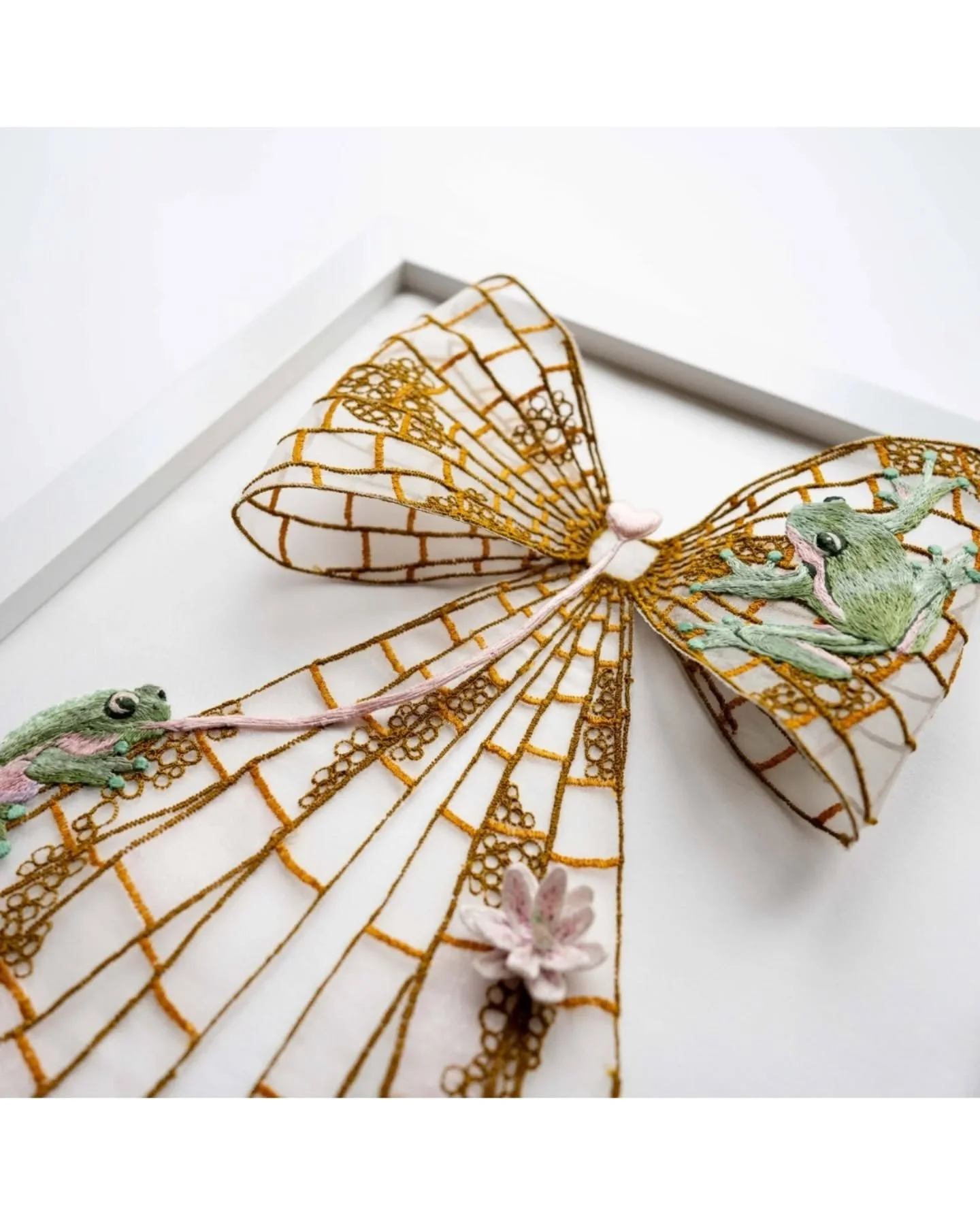 A big thank you to @embroidery_mag for the lovely feature of the winners from this years National Embroidery Awards ✨️ 

I'm late to the party, but I'm absolutely thrilled to see my little frog bow in the pages of a magazine that always inspires and 