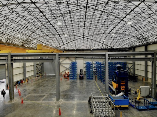 This factory building takes advantage of natural light with PVC-coated fiberglass fabric.