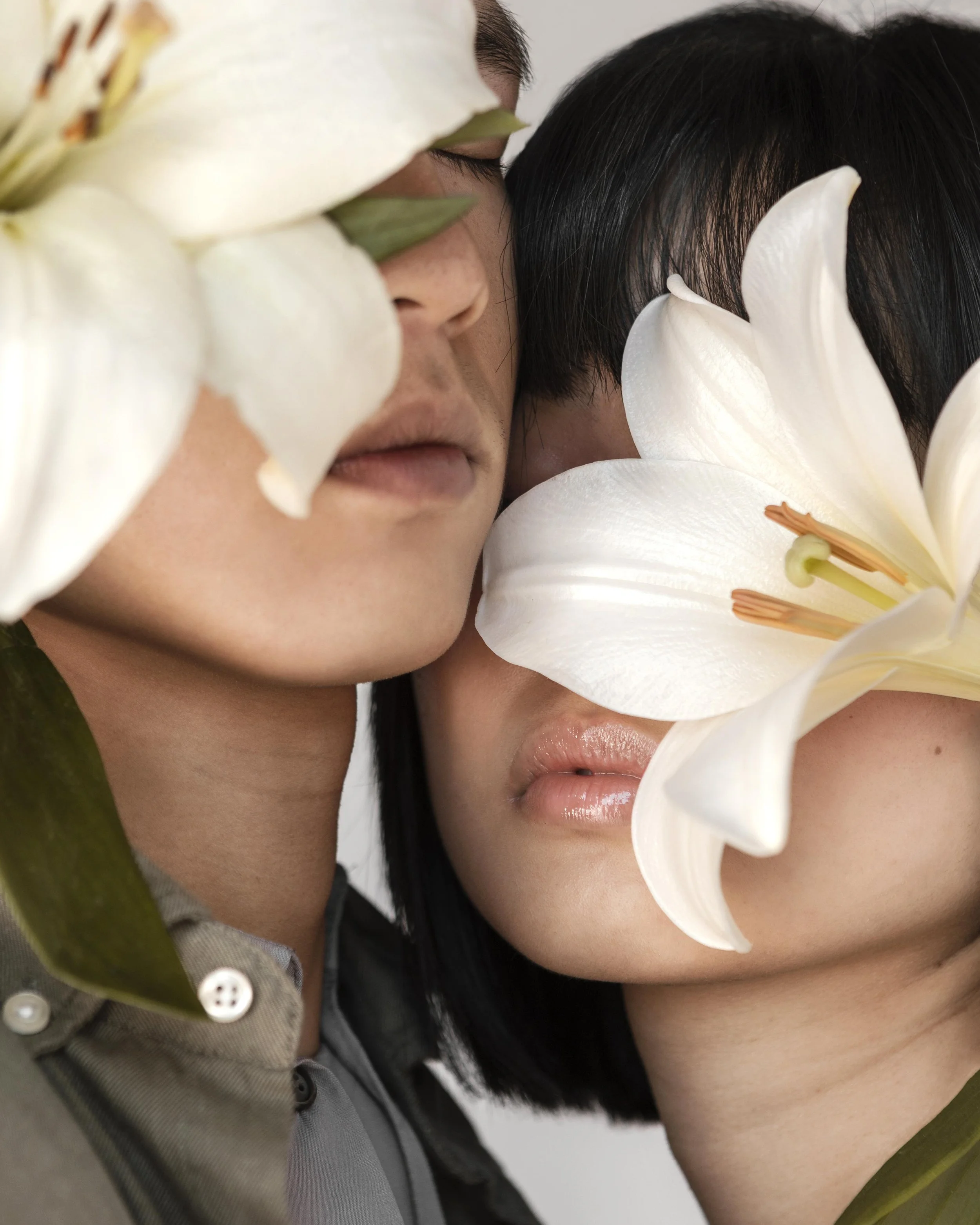 couple-eyes-covered-by-flowers.jpg