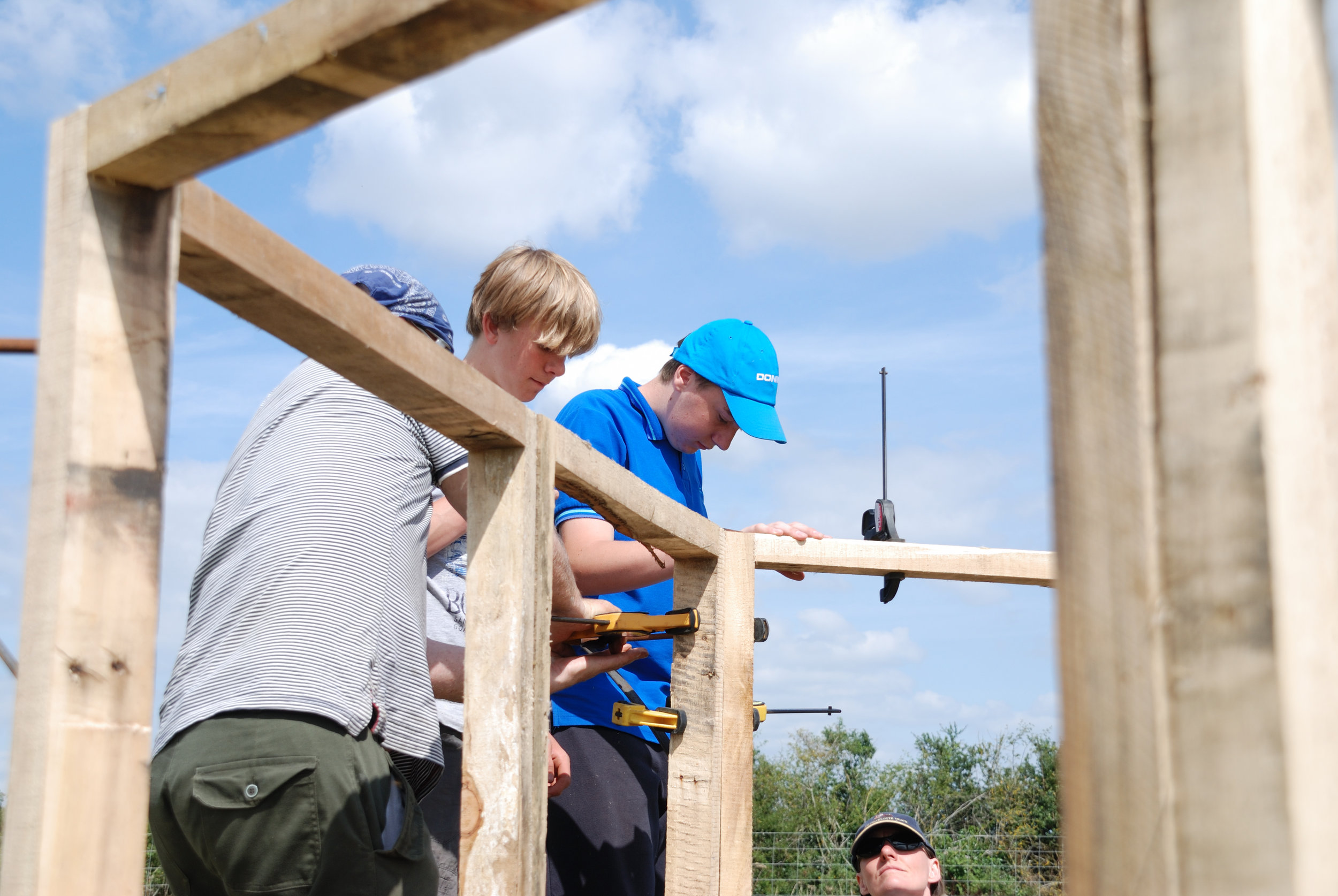 2013 NCS volunteers design and build woodland shelter.JPG