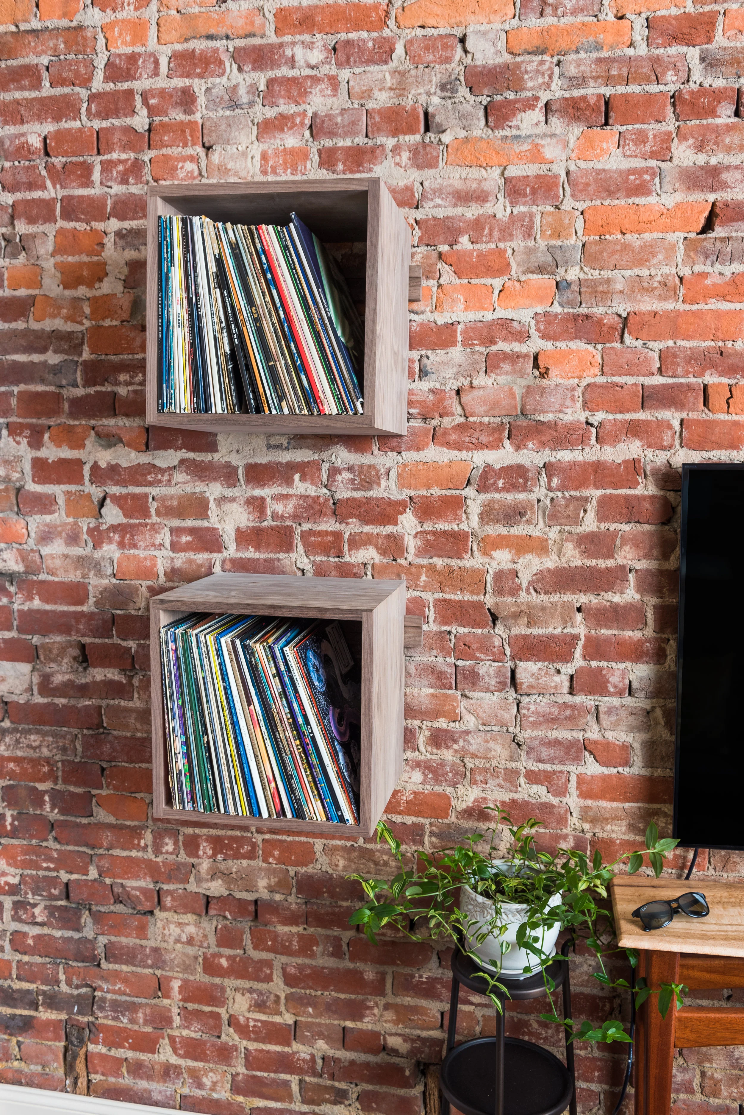 Walnut Deep Cut Shelves on Exposed Brick