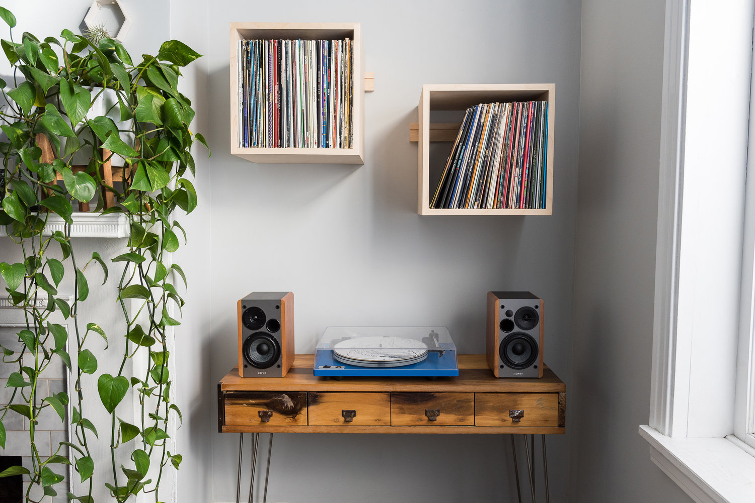 We designed and made our wall-mounted cube shelves and record display racks because we think they are the best.