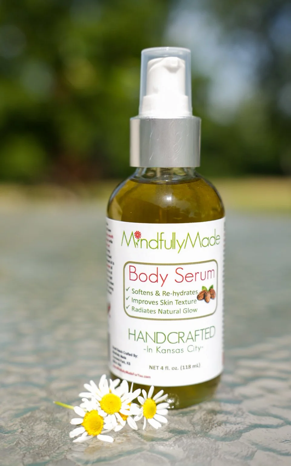 Mindfully Made Body Serum made with slow-infused chamomile, calendula, lavender, rose petals, marshmallow root, and grapeseed oil.