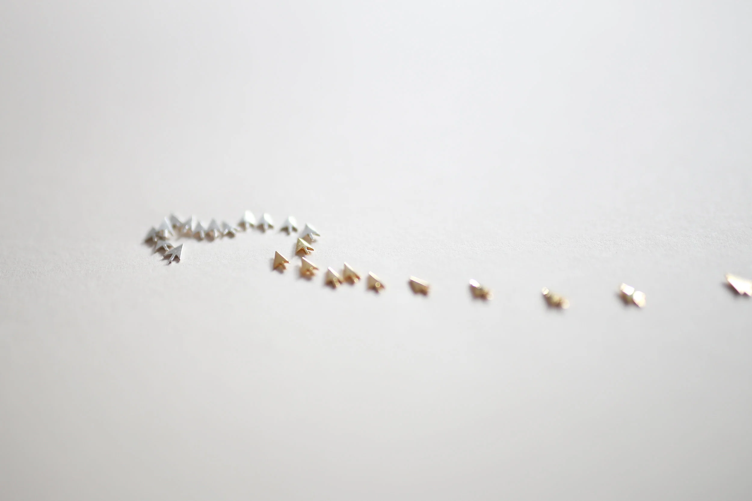 Human Interface Jewellery_Cursor trail_Icon earrings.jpg