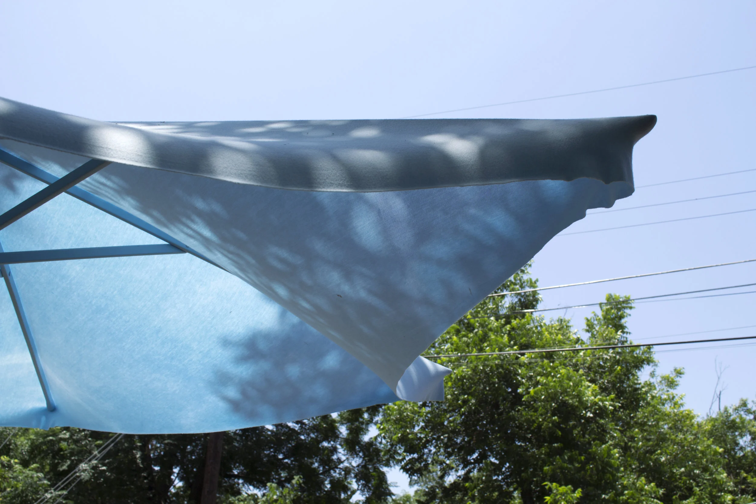 Rachael Starbuck a soft place cloth, wood, epoxy putty, sunlight, single channel video 4m loop 92” x 92” x 90”, 2018