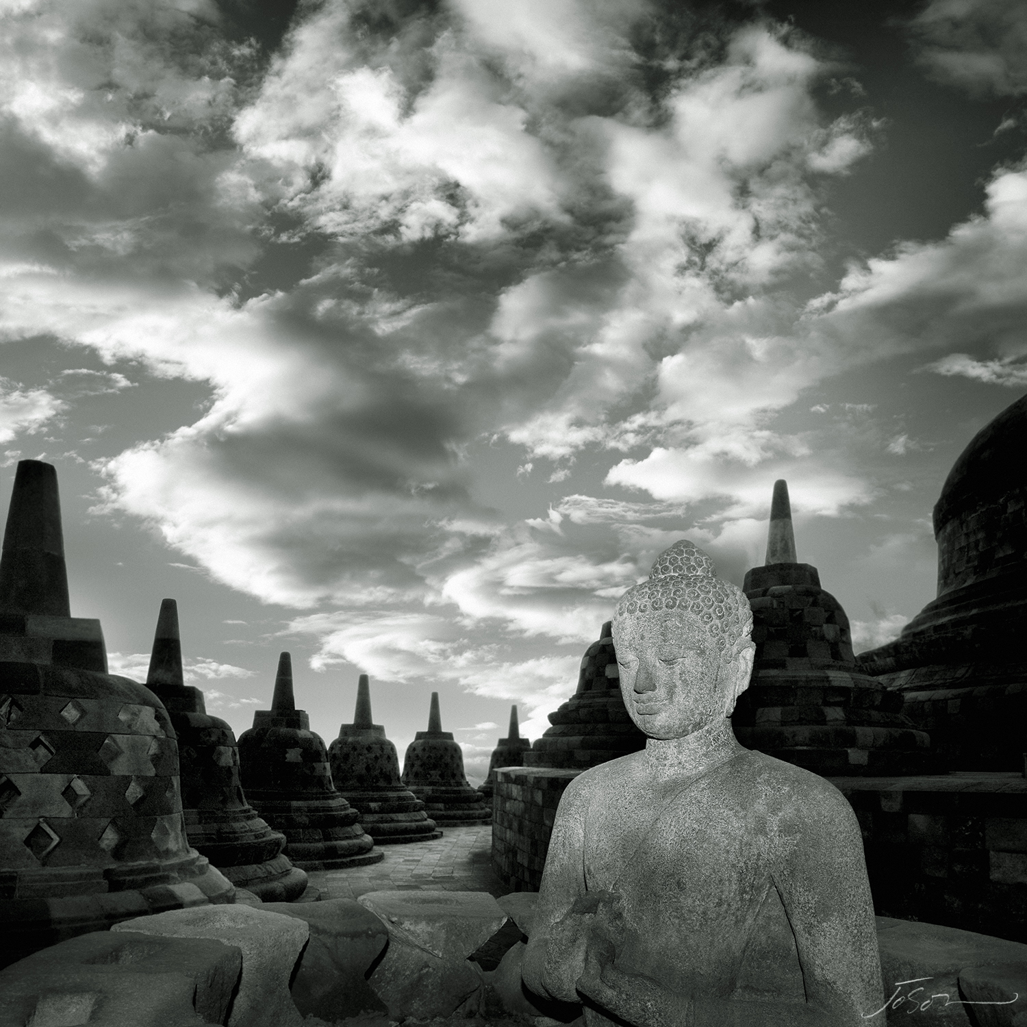 Statue of Buddha in Stupas at Borbudur Temple II, Yogyakarta, Indonesia.jpg