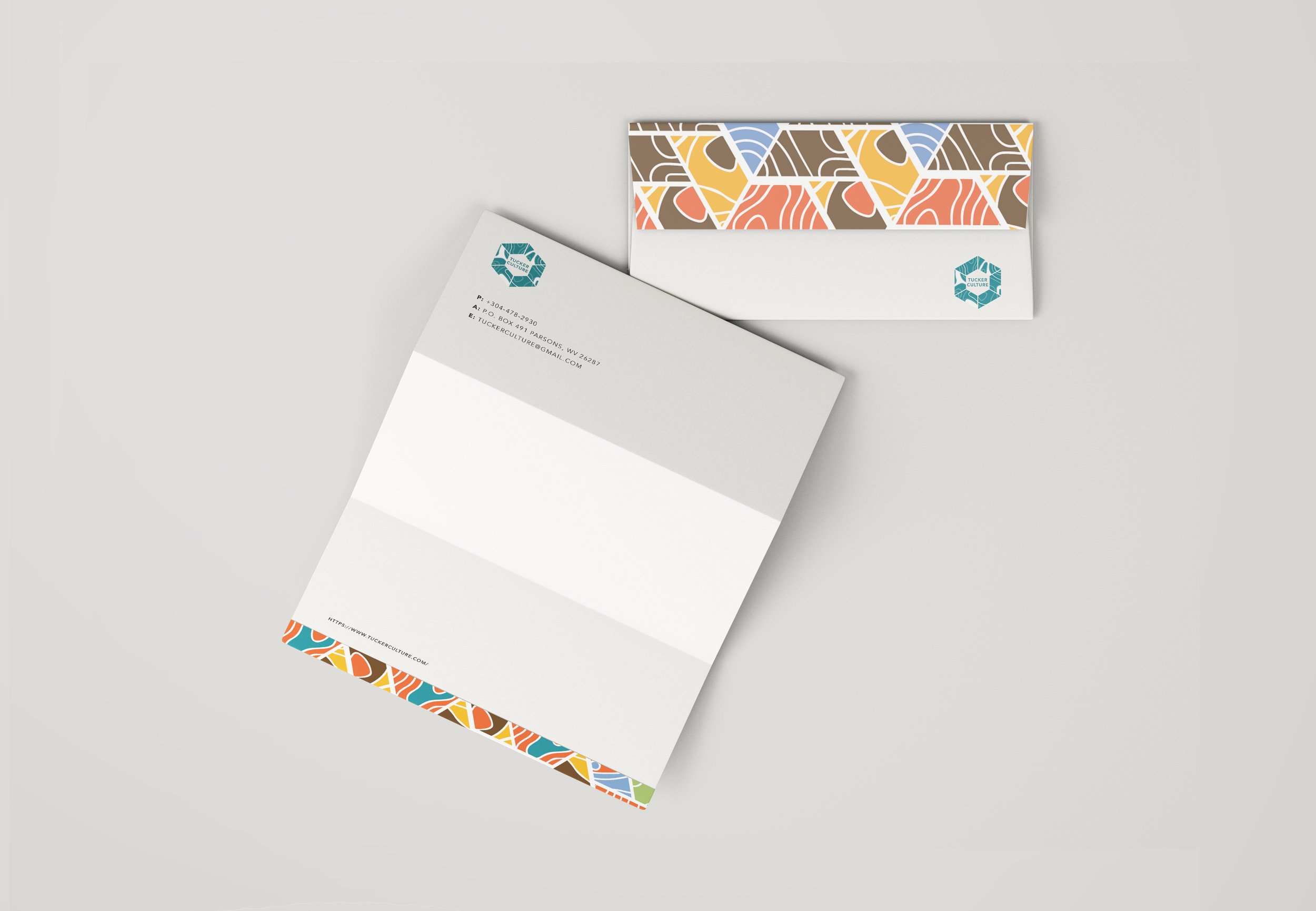 Envelope+and+Letterhead+Mockup.jpg