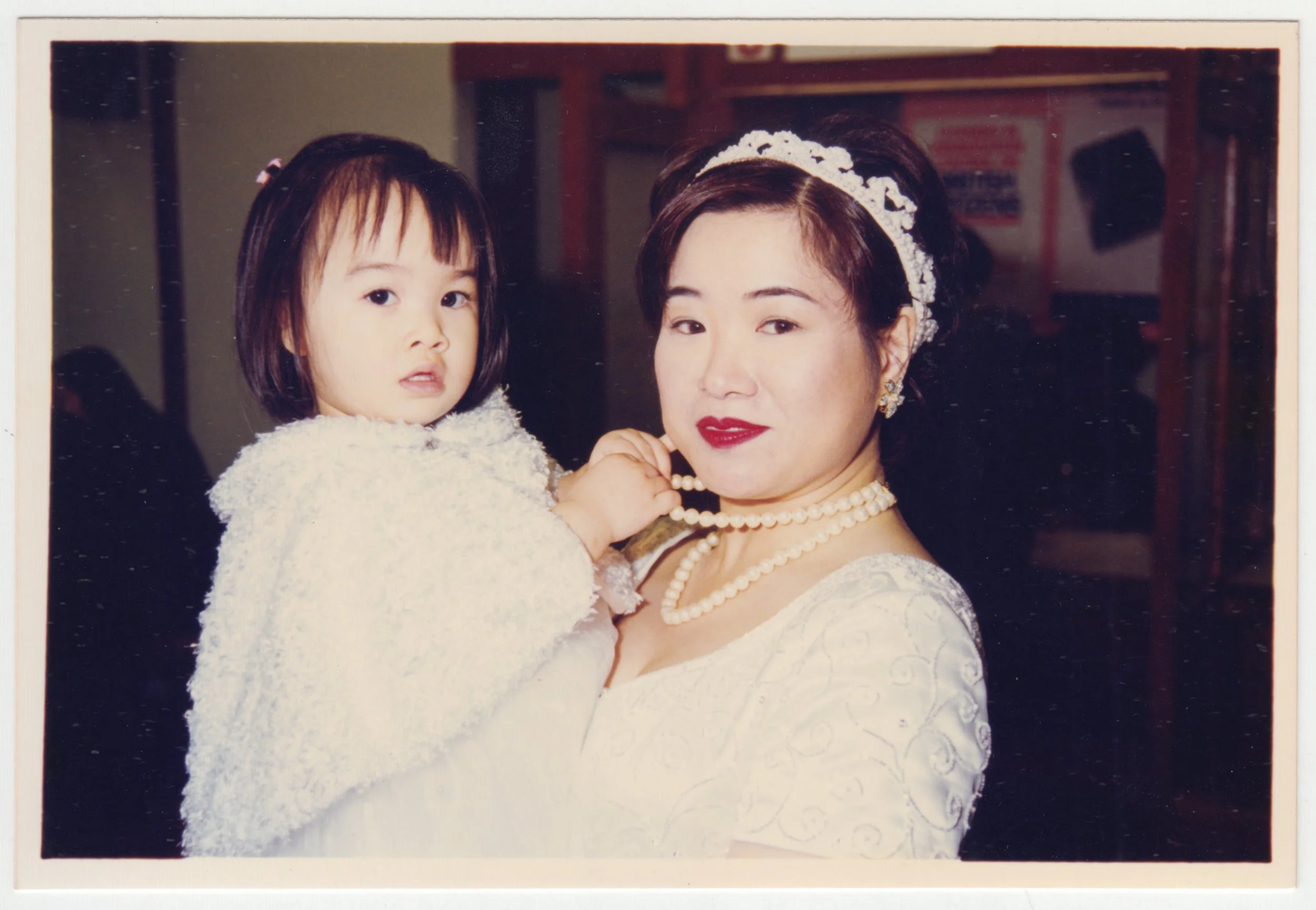 EE carrying Charlotte at her marriage registration at Shatin Marriage Registry. Taken on 22 December 1997.