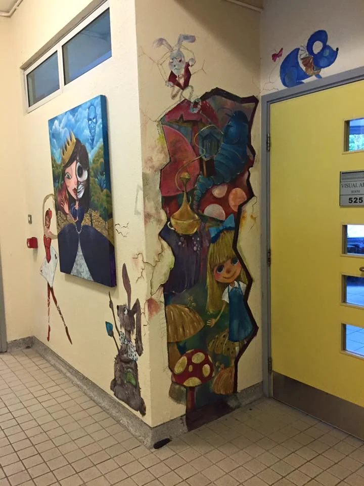 Alice in Marymount (2011). Acrylic mural on stucco wall. Featuring Snow White (2011) on adjacent wall.