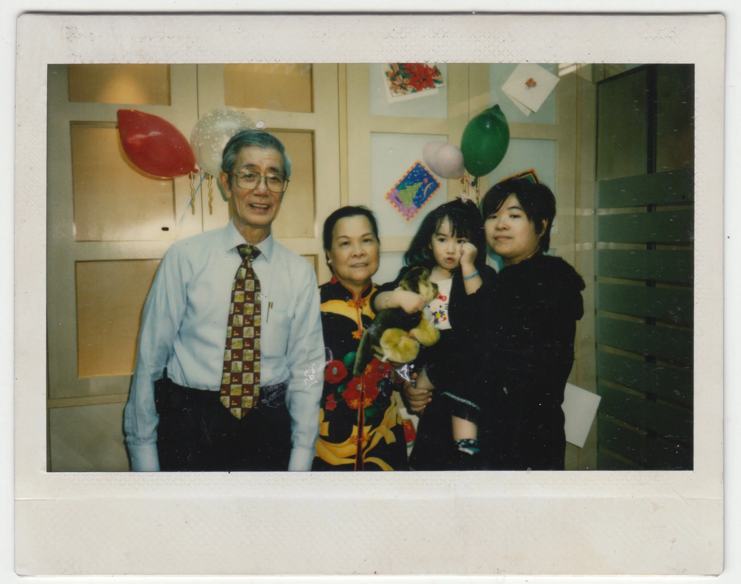Polaroid photograph of a possible birthday party, c. 2000 - 2001