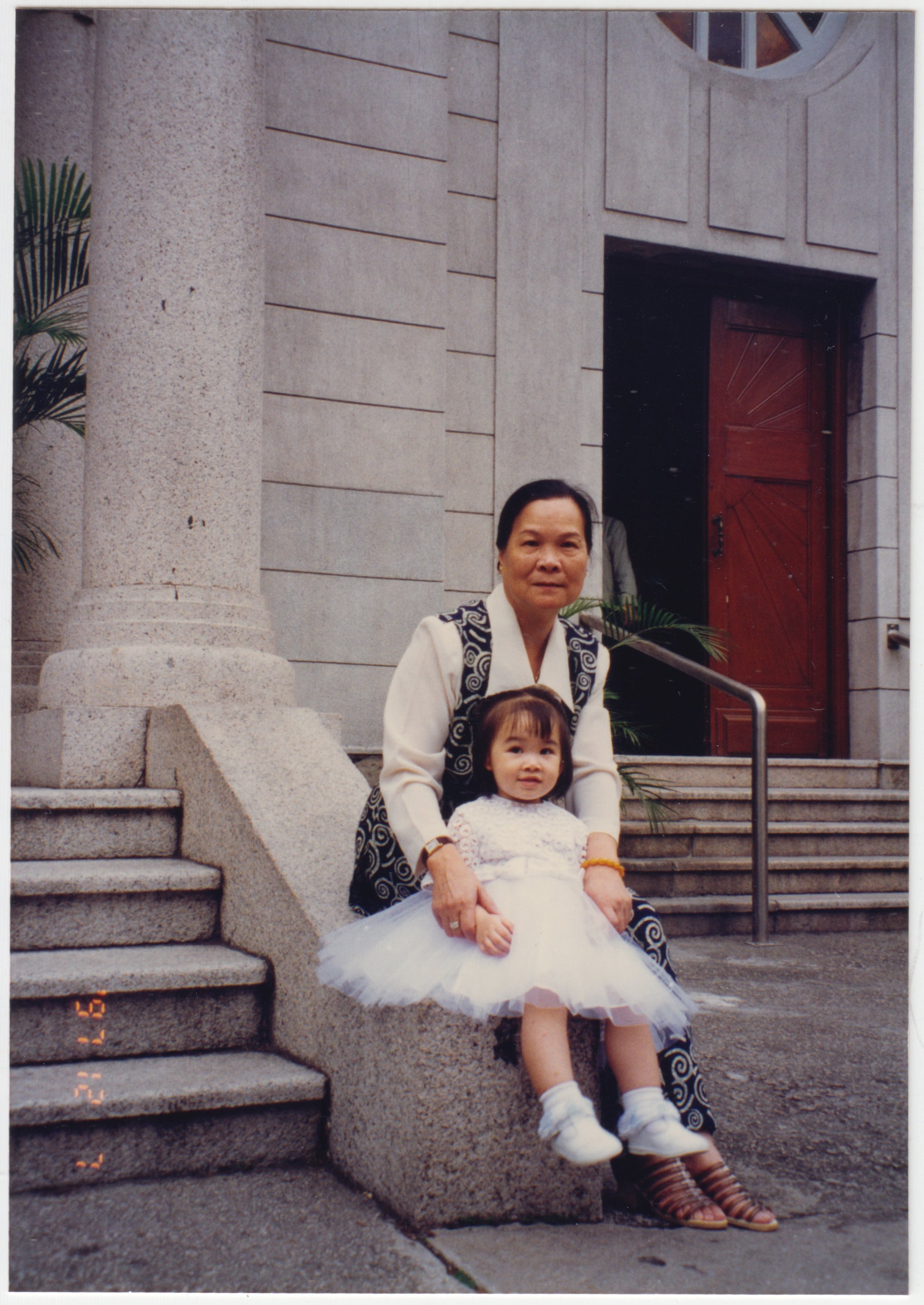 Grandma & Charlotte outside unidentified church after Charlotte's Catholic Baptism, 7 December 1997.