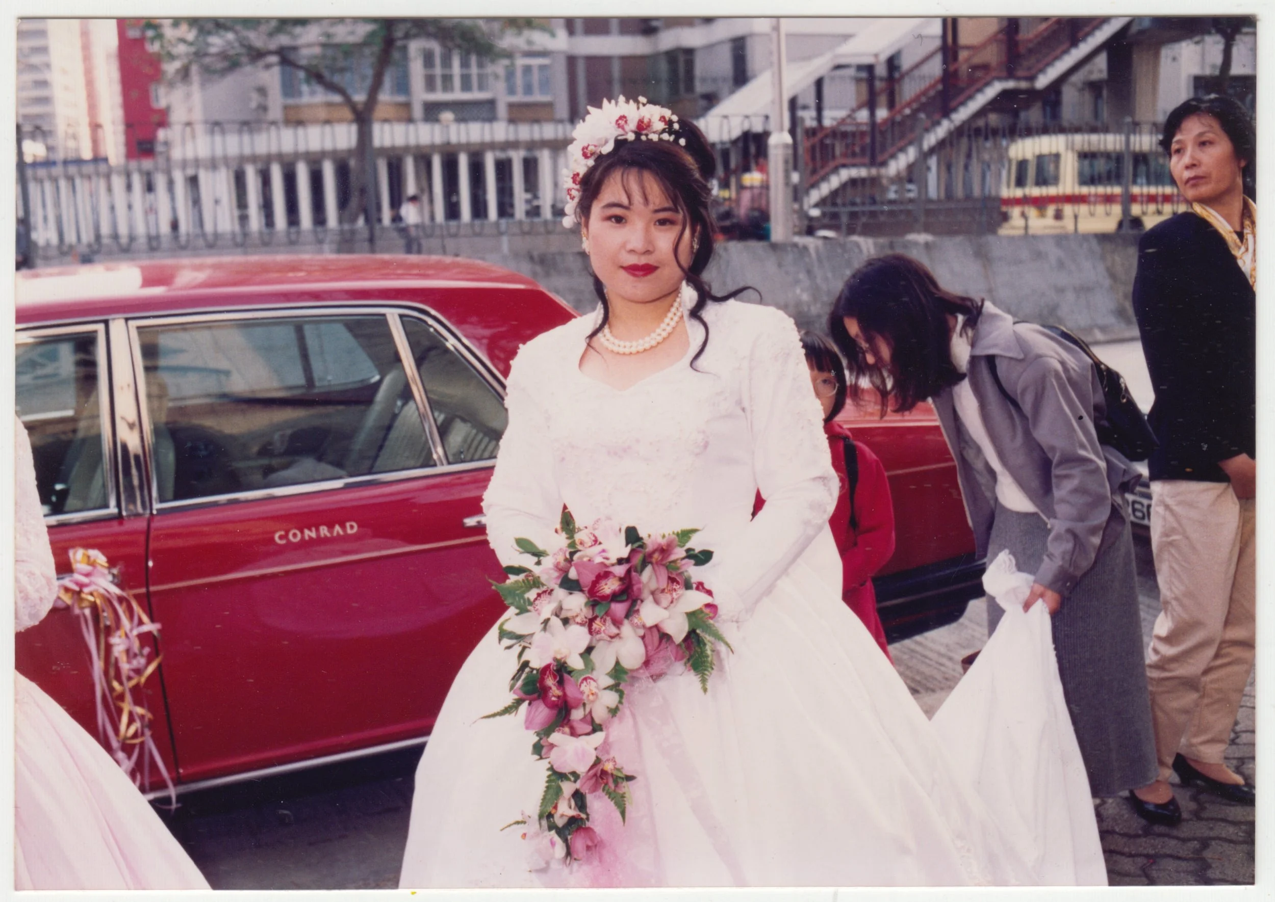Mum as a bride outside St. Theresa’s Church in Kowloon Tong, c. December 1993. 