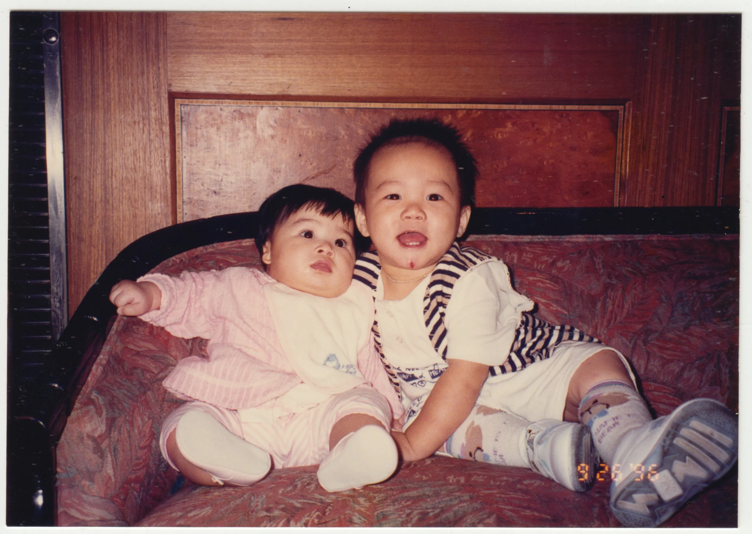 Charlotte & Leon Wan at a family banquet, 26 September 1996. Leon is a distant cousin but only 10 months older so we grew up together.