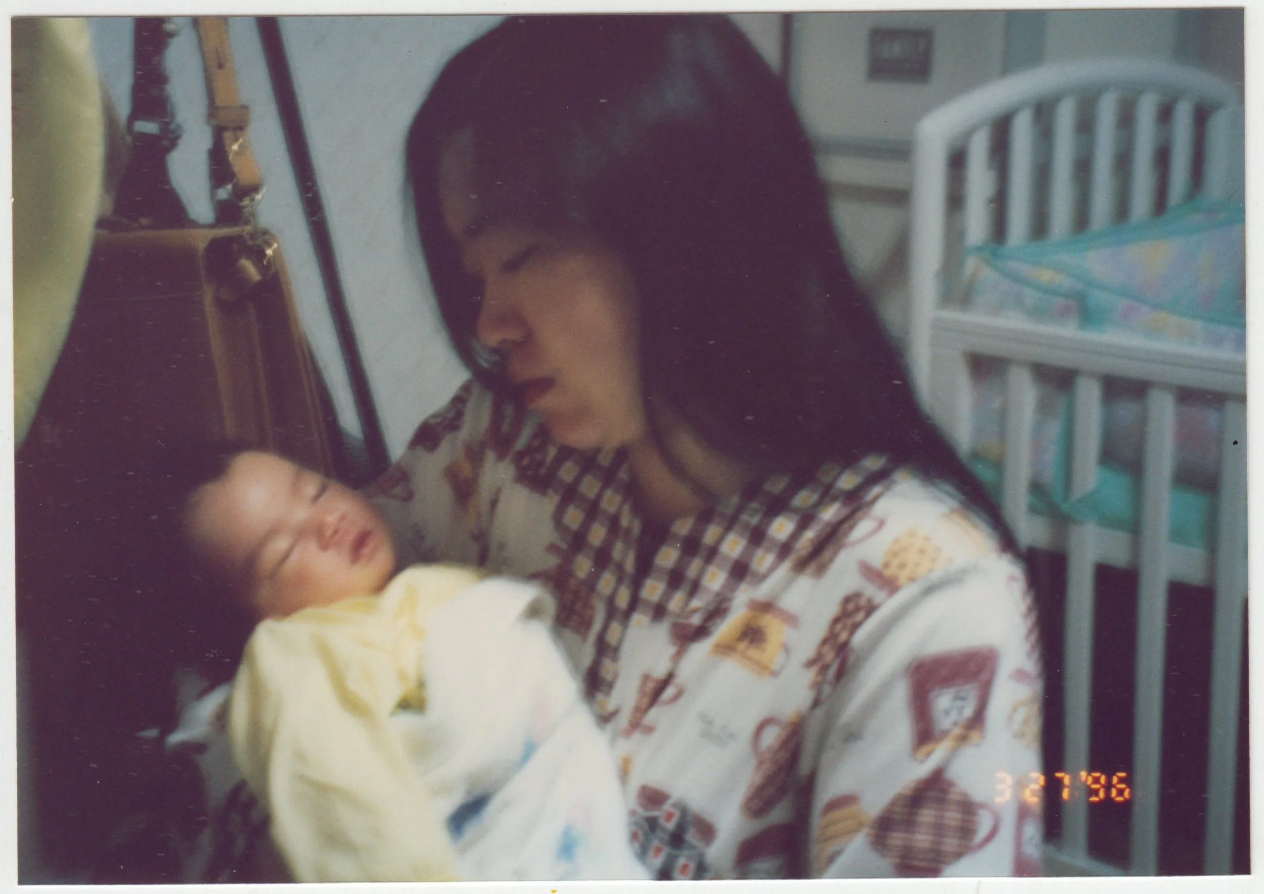 EE and Charlotte at home, on 19/F, taken on 27 March 1996.