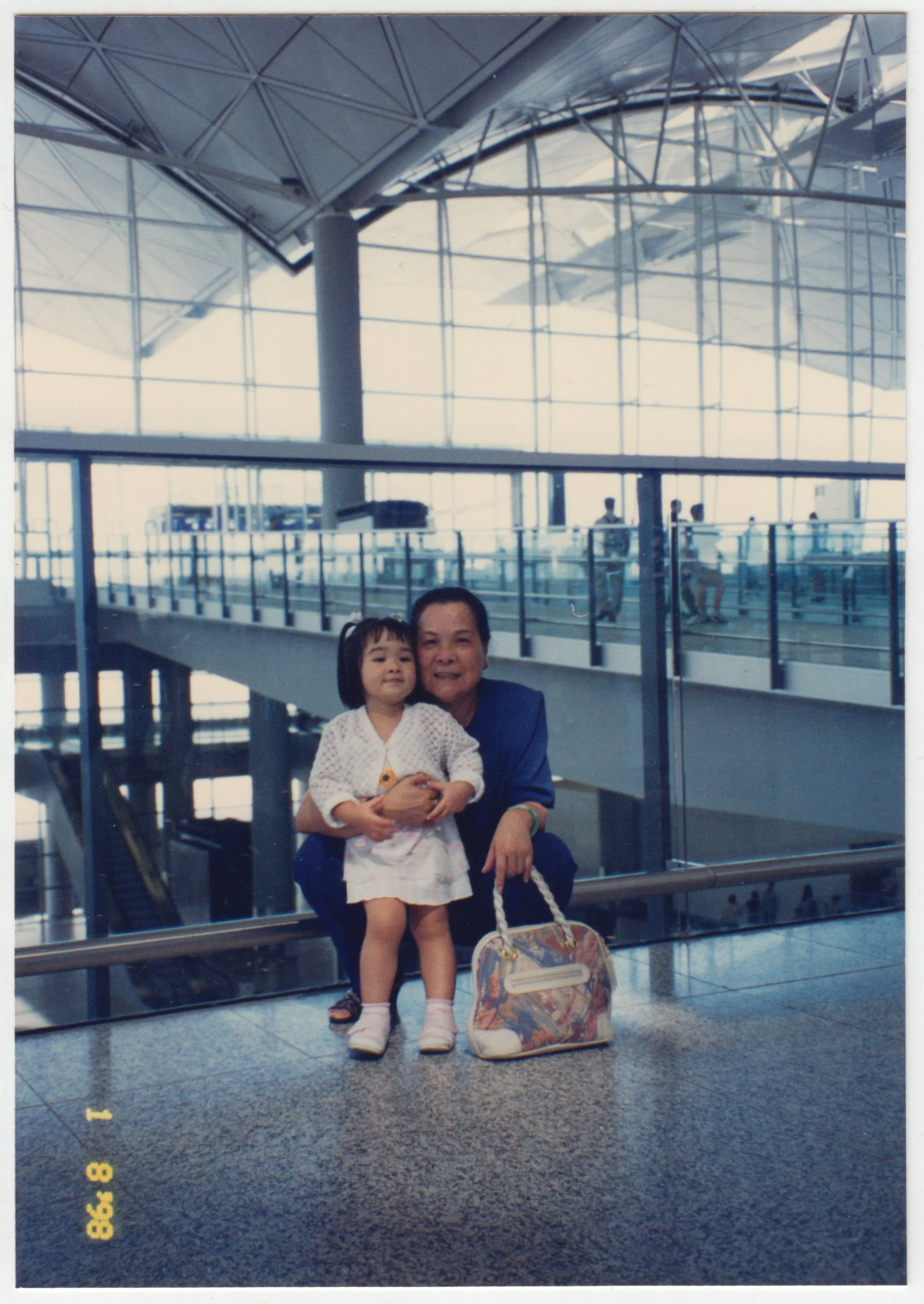 Grandma & Charlotte at Hong Kong International Airport	 on 1 August 1998.