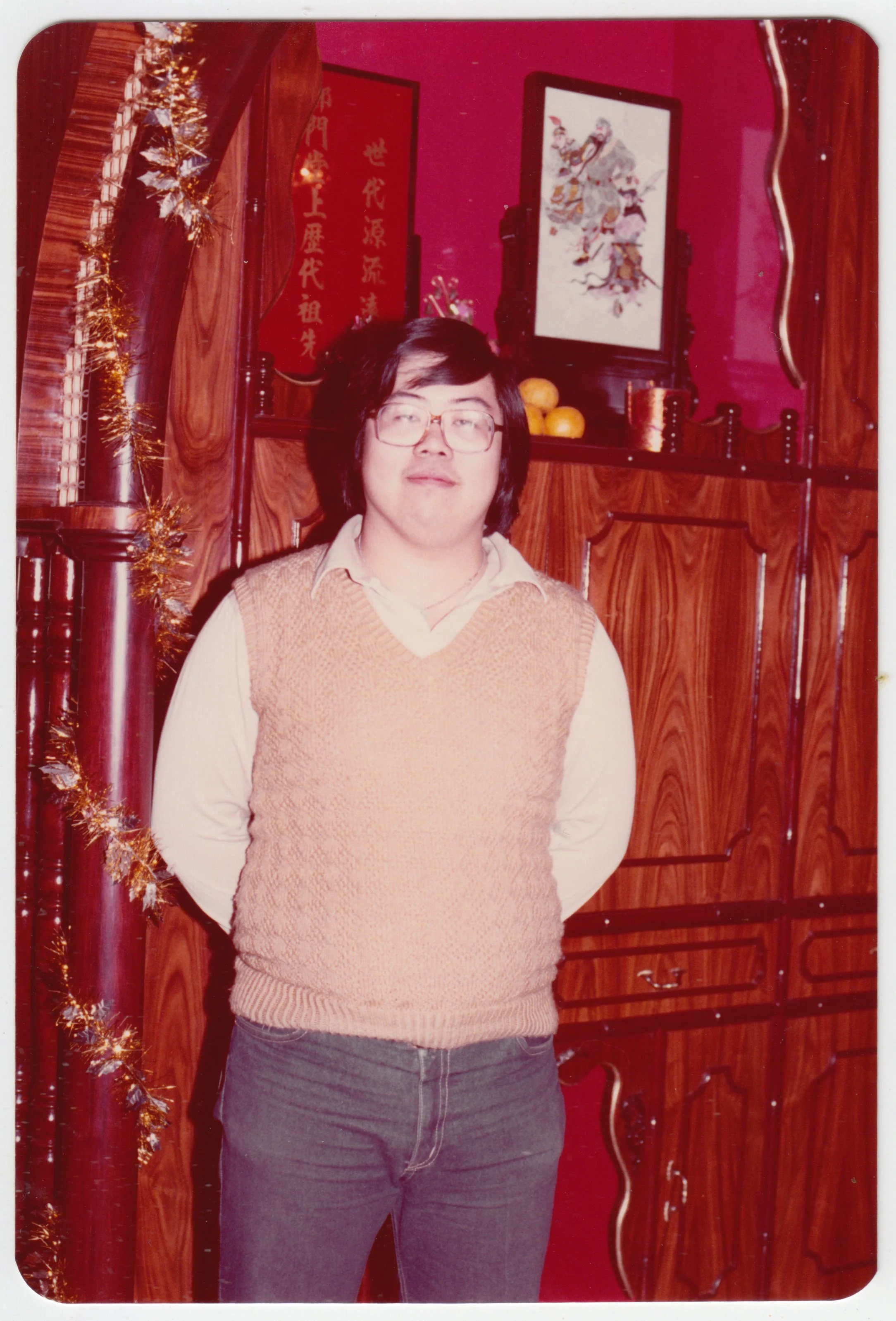 no. 00423 / Uncle Edward in front of the Ancestral altar on 18/F, Wing Ying Manion, c. 1980-1981