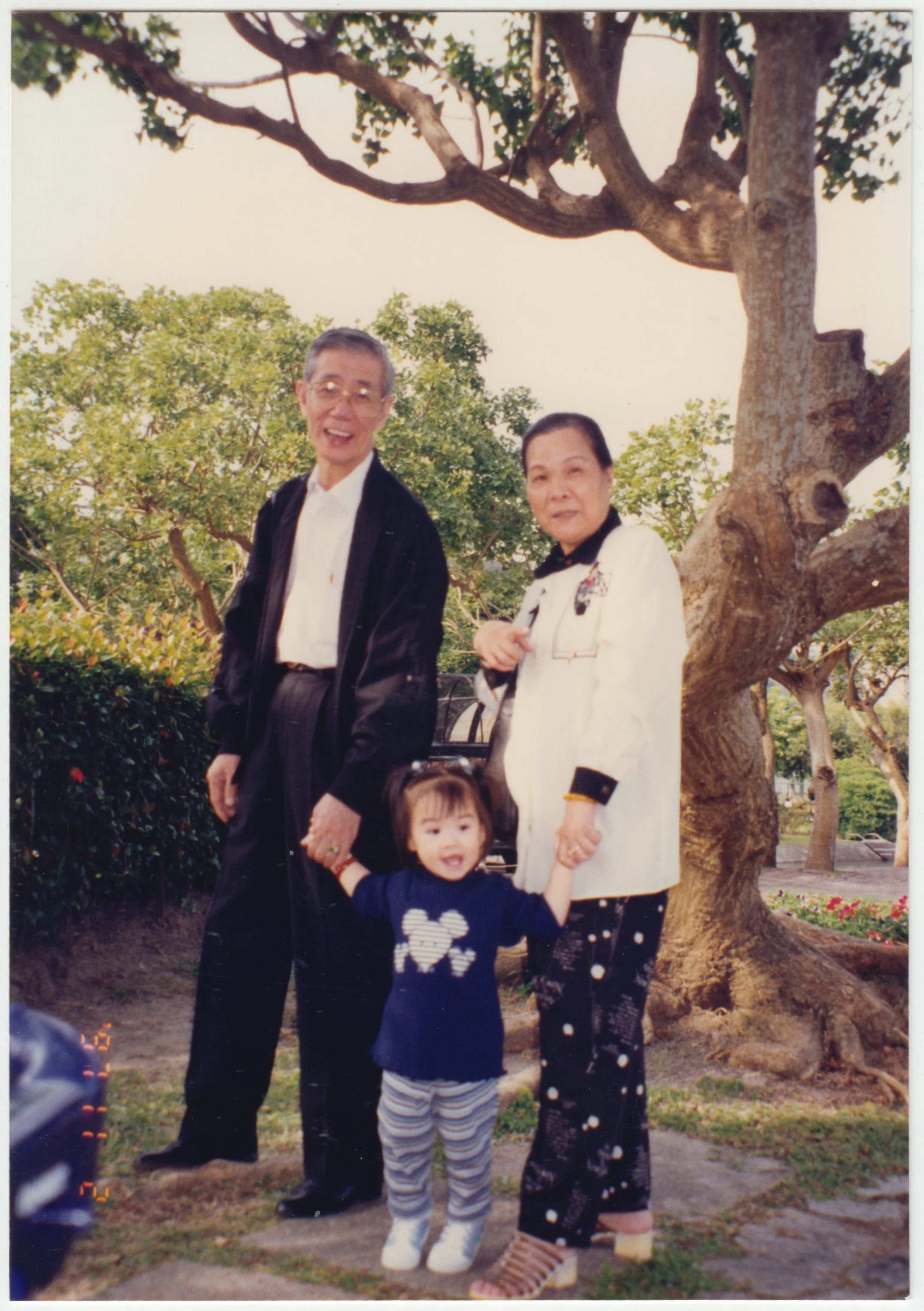 Grandpa, Grandma & Charlotte at a park	on 2 November 1997