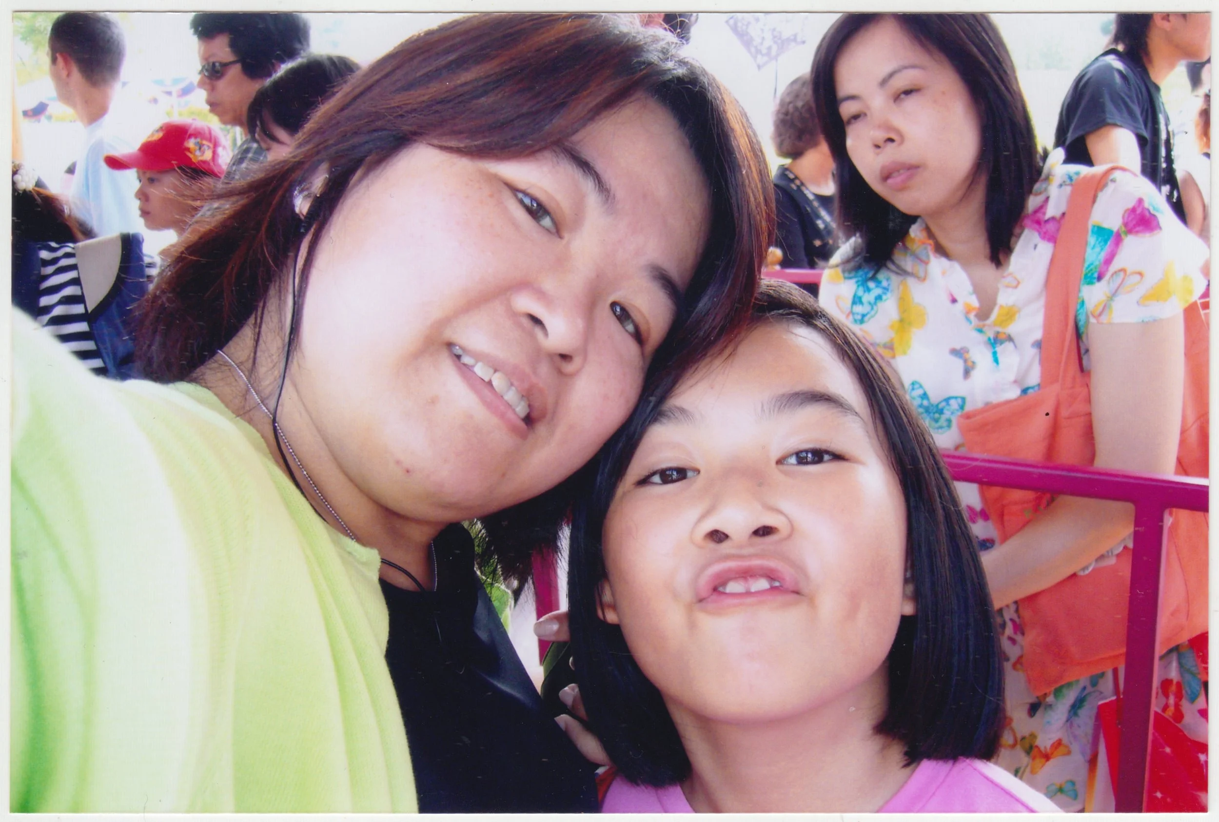 Taken during the opening of Hong Kong Disneyland, c. 2005. This was a huge family affair to visit Disneyland where we booked hotels and buffets for us and grandparents and the uncles to join us.