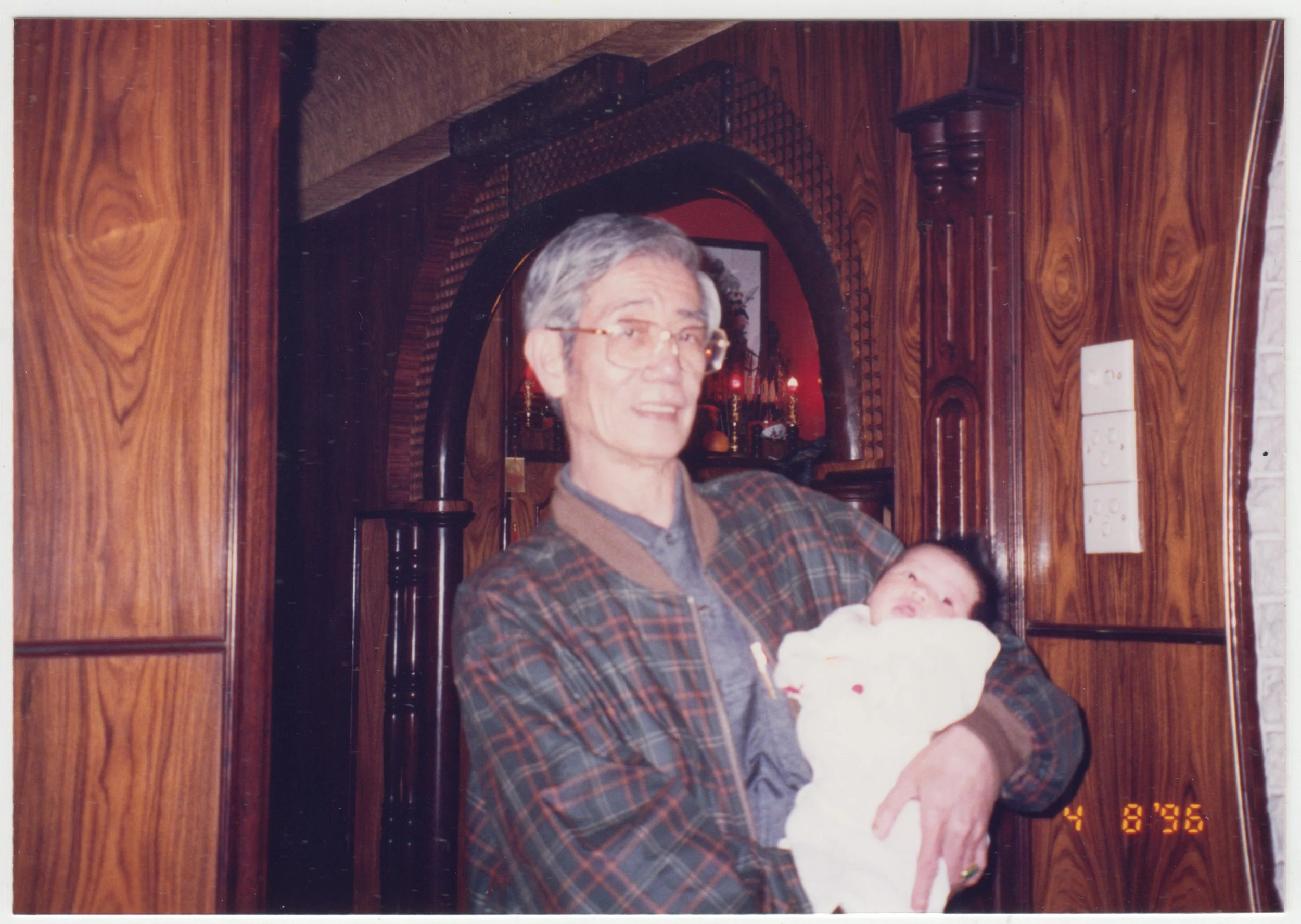 Grandpa & Charlotte at home on 18/F, taken on 8 April 1996.