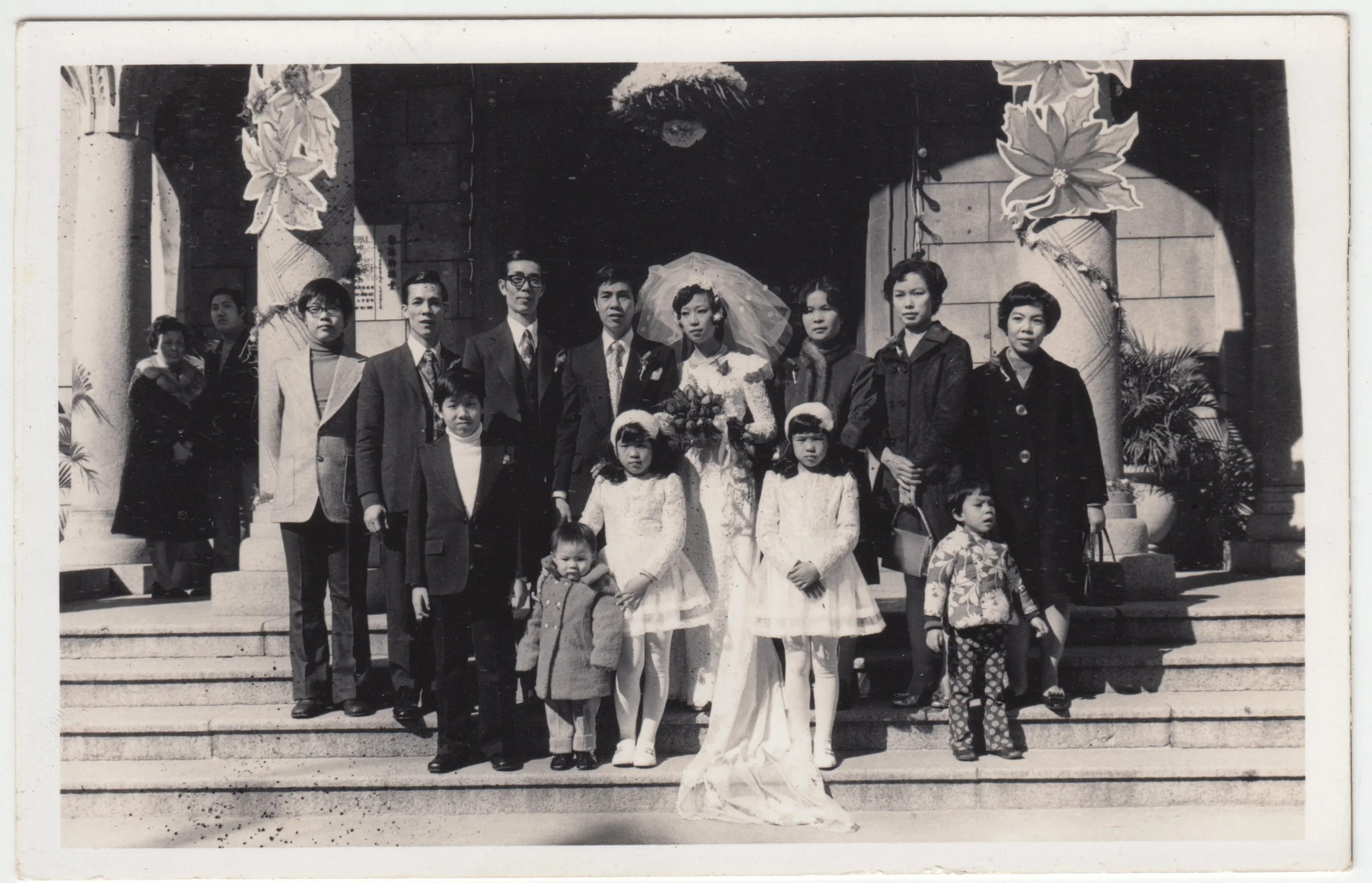五叔公’s Wedding, c. 1970s.

From left to right:

Back: Uncle Edward, 三叔公, Grandpa, 五叔公, 五叔婆, Grandma, 三叔婆, 四姑婆 

Front: Uncle William, Uncle Day, Mum, EE, 表姨