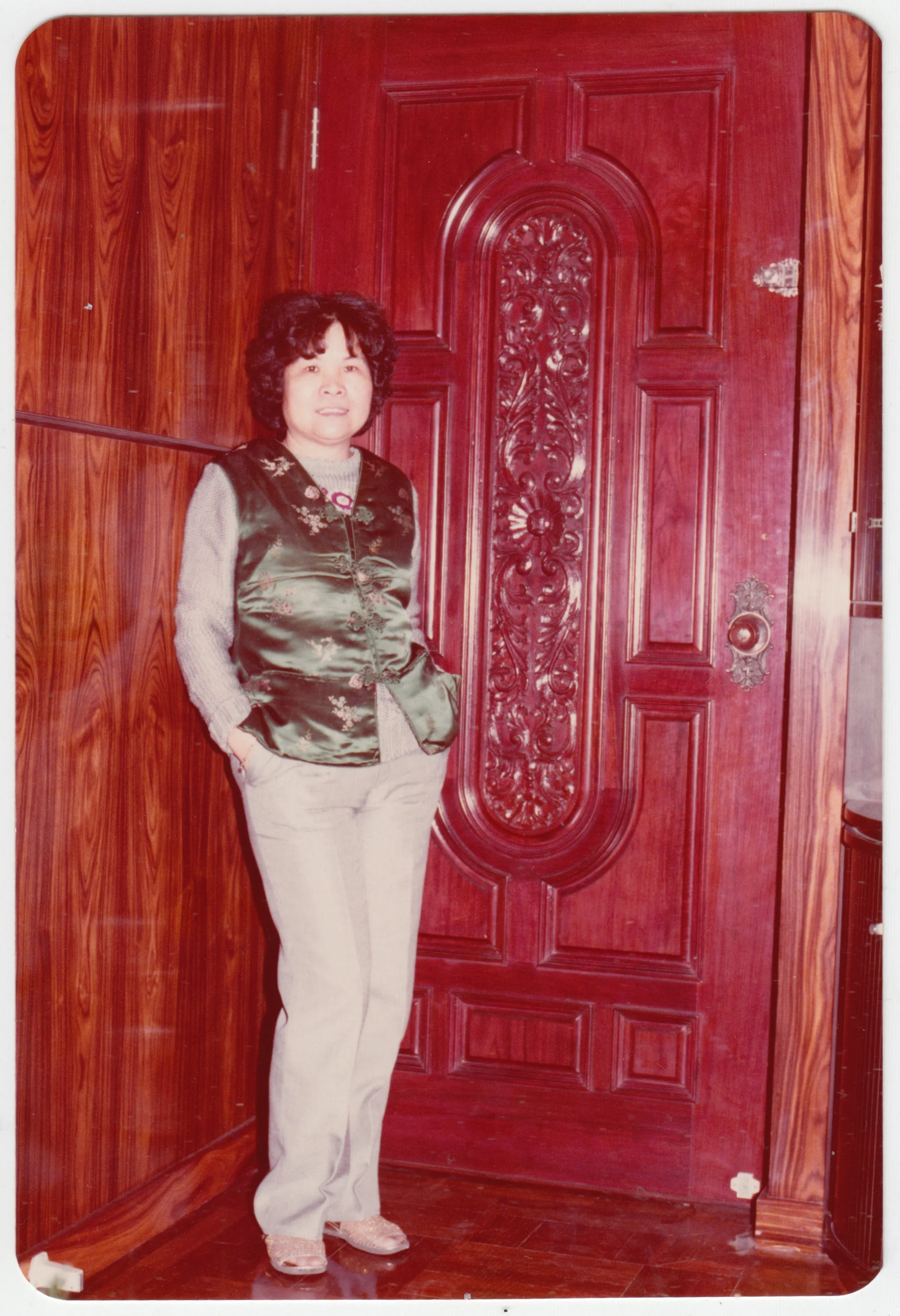 Grandma by the door on 18/F, c. 1980 - 1981. For more photos of our home, see 'Home'