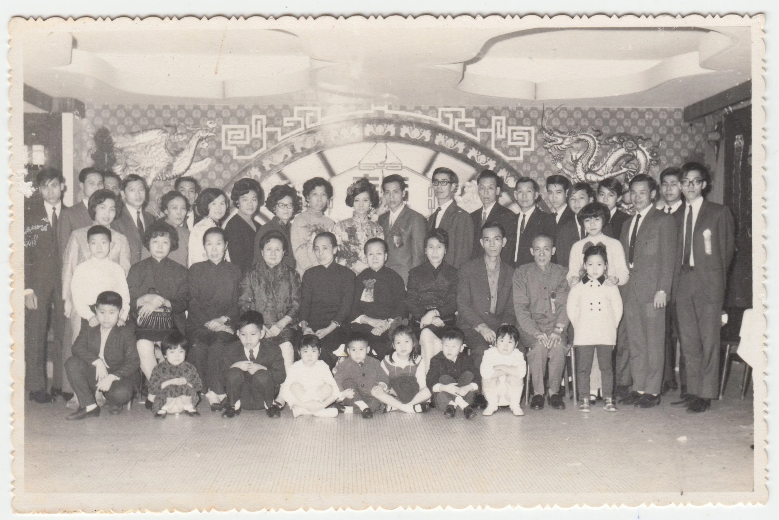 牛表叔婆 & 牛表叔公’s Wedding, c. 1970s.	

From left to right:

Back: Yu Gor 表叔公, Chu 表叔公, 四姑丈公, Dak Kwun 表叔公, 表姑媽, 三叔公, Grandma, ?, ? , ?, 牛表叔婆, Ngau Biu Suk, Grandpa, ?, ?, ?, ?, ?, ?, ?, Tsui Wai Yuen 表叔公

Middle: 四姑婆 , Uncle William, ?, 9 姨太婆, ?, 7 姨太婆, 