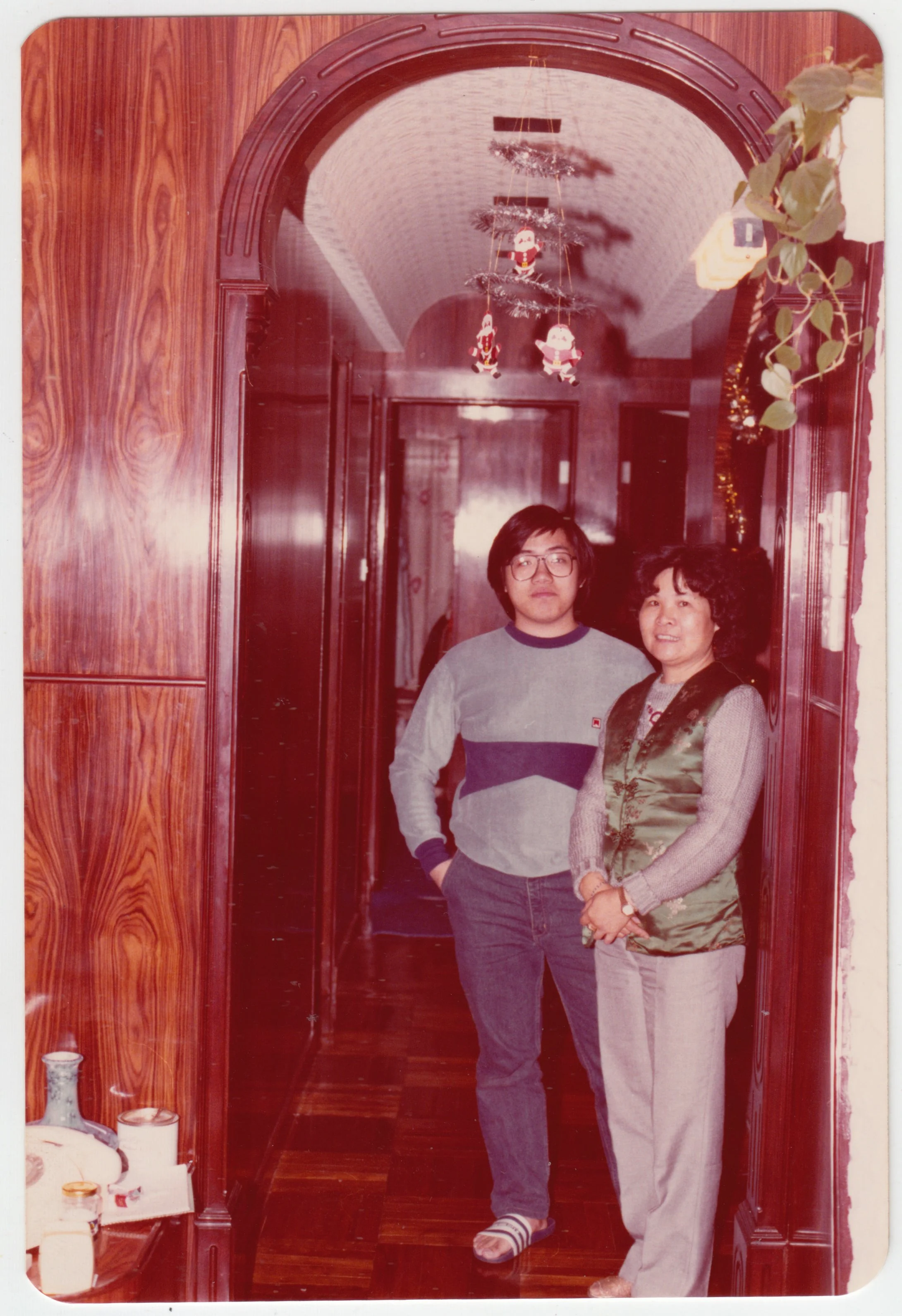 Uncle William & Grandma in the corridor on 18/F, c. 1980-1981.