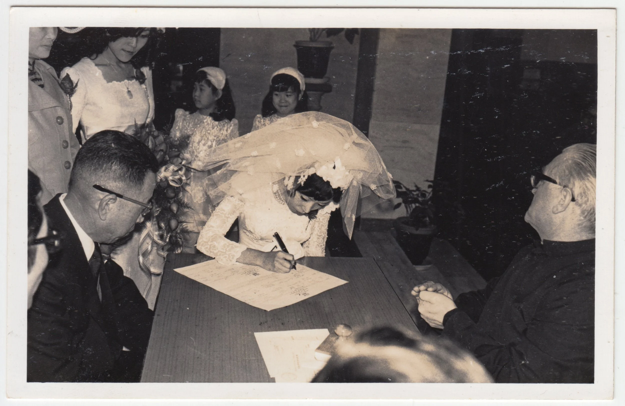 五叔公’s Wedding, c. 1970s. 五叔婆 signing her marriage certificate. Mum and EE could be seen behind her. CM: I'd like to move this photo to Assholes section if no one objects.