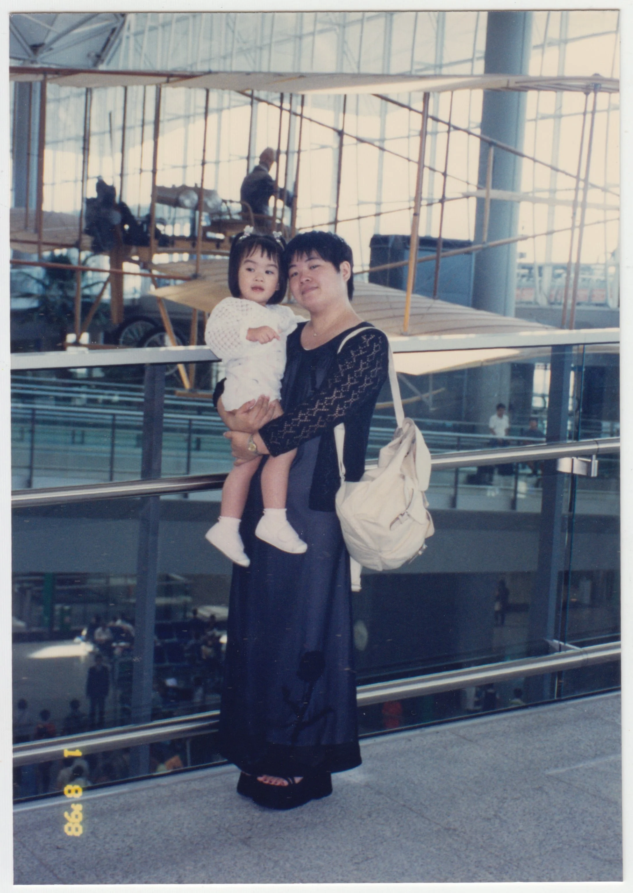 Mum & Charlotte at Hong Kong International Airport on 1 August 1998.