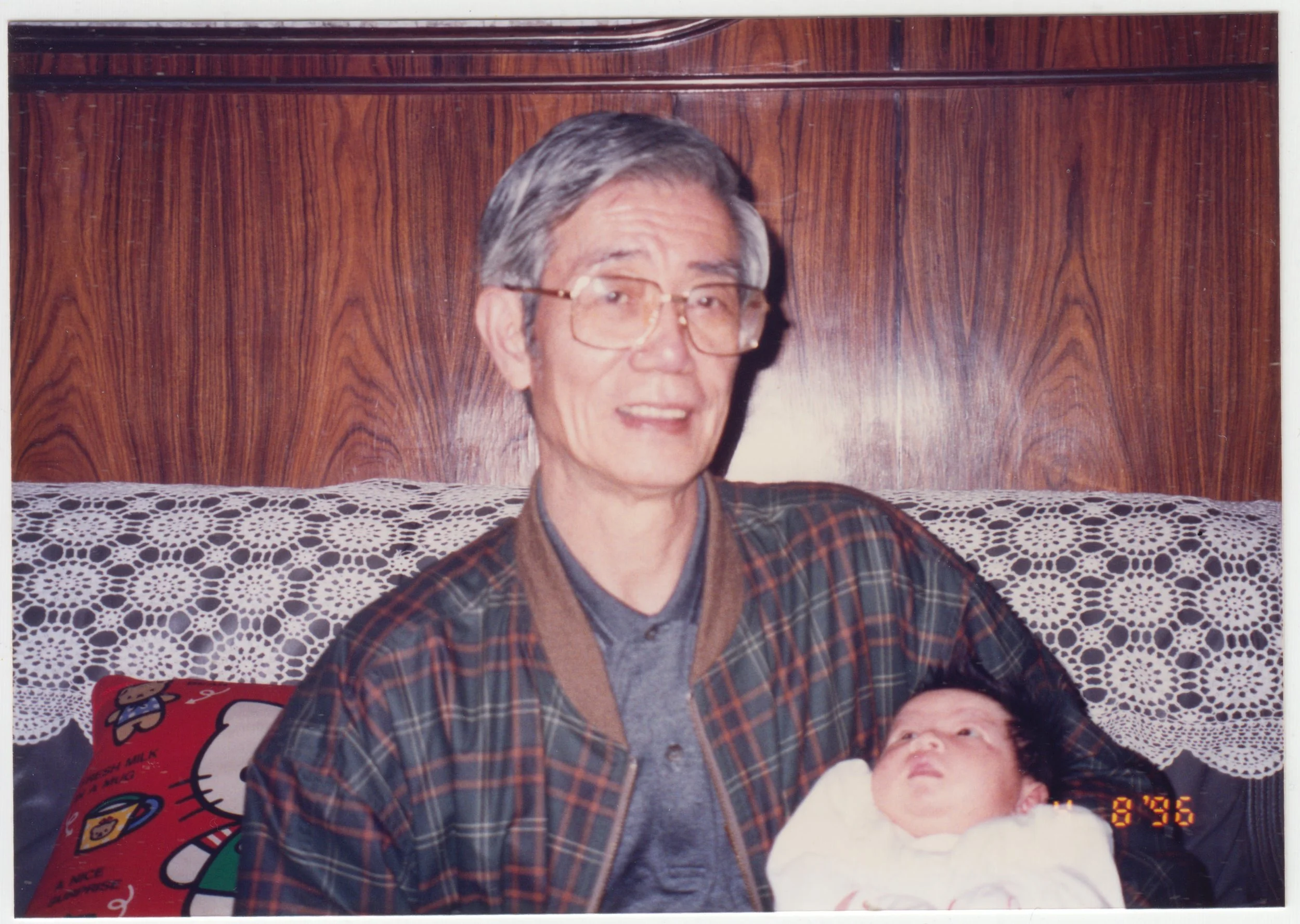 Grandpa & Charlotte at home on 18/F, taken on 8 April 1996.