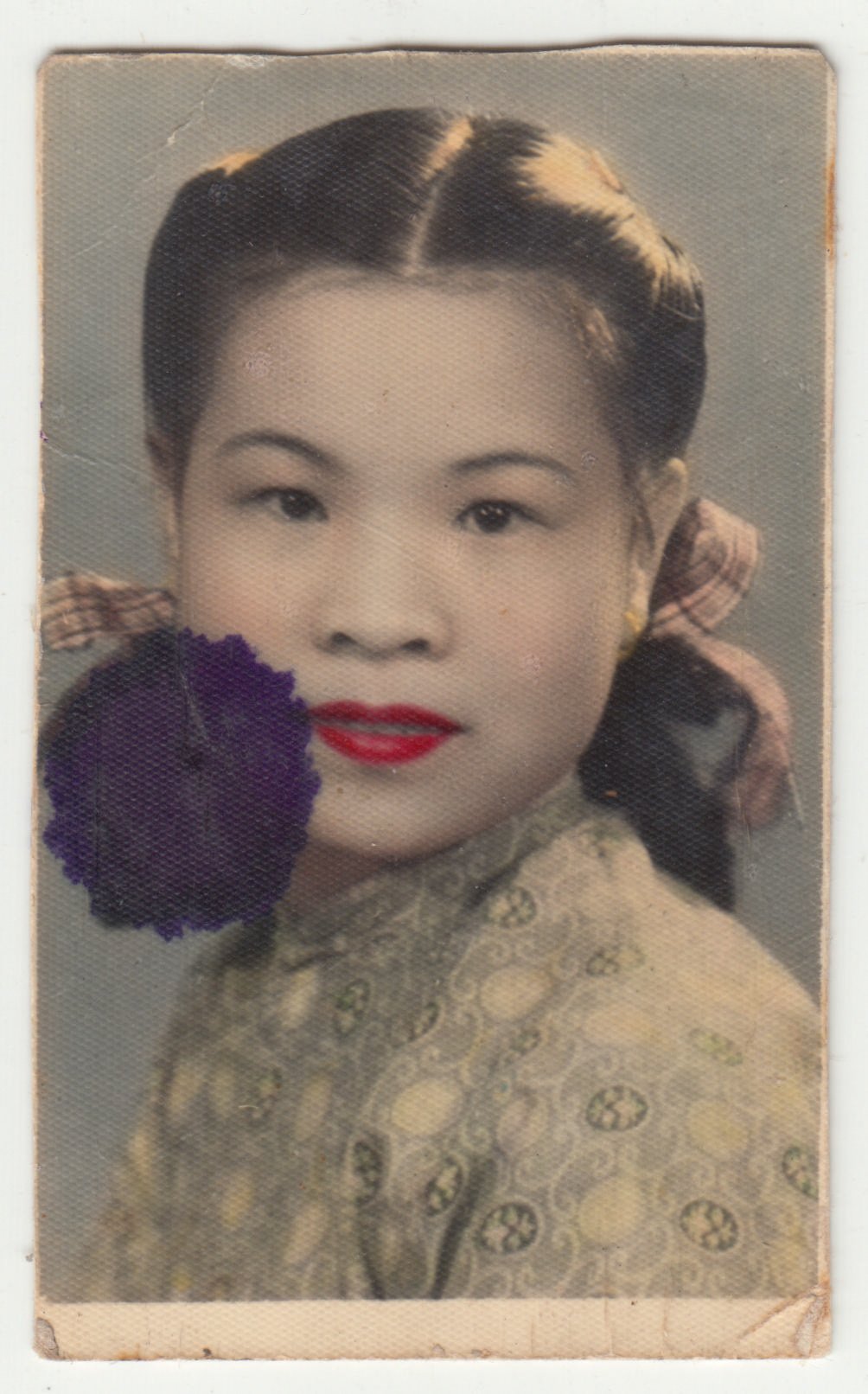 Colourised Portrait of Grandma, c. 1940s. Affected by ink blot.