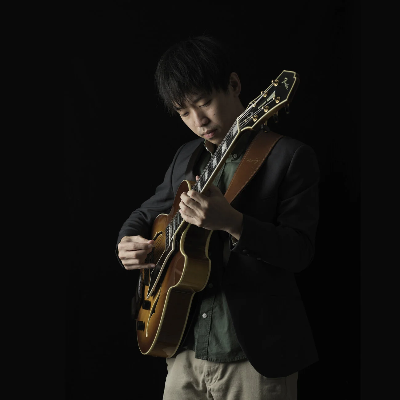   JOE LEE ON BASS GUITAR - MEMBER OF THE JAZZ ASSOCIATION OF SINGAPORE 