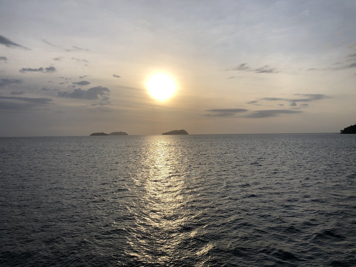 The sun sets over the South China Sea