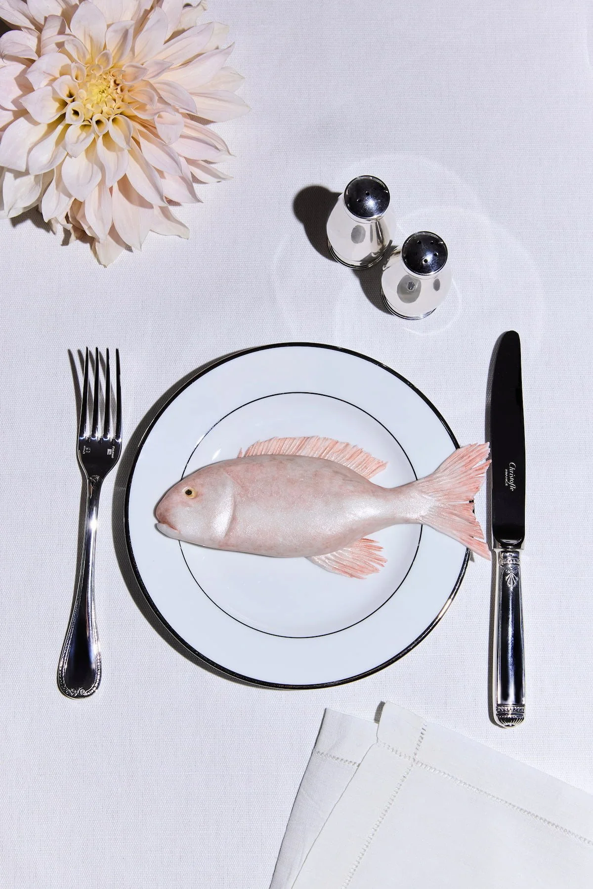  Sugar sculpture fish plated as a whole fish course, styled with cutlery and a dahlia flower — a trompe-l'œil concept by Chi-Young Bang 