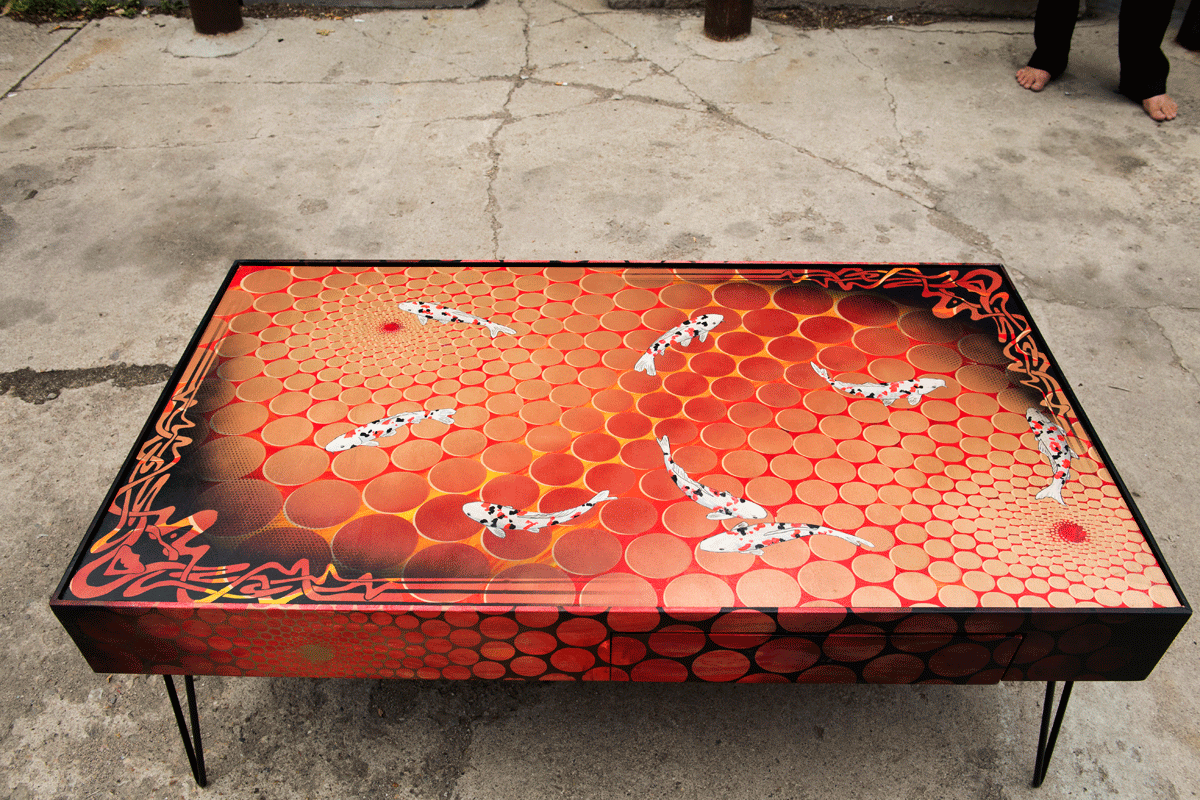  lavafish table  49"x27"x18"tall  mixed media on maple panel with steel hairpin legs. 