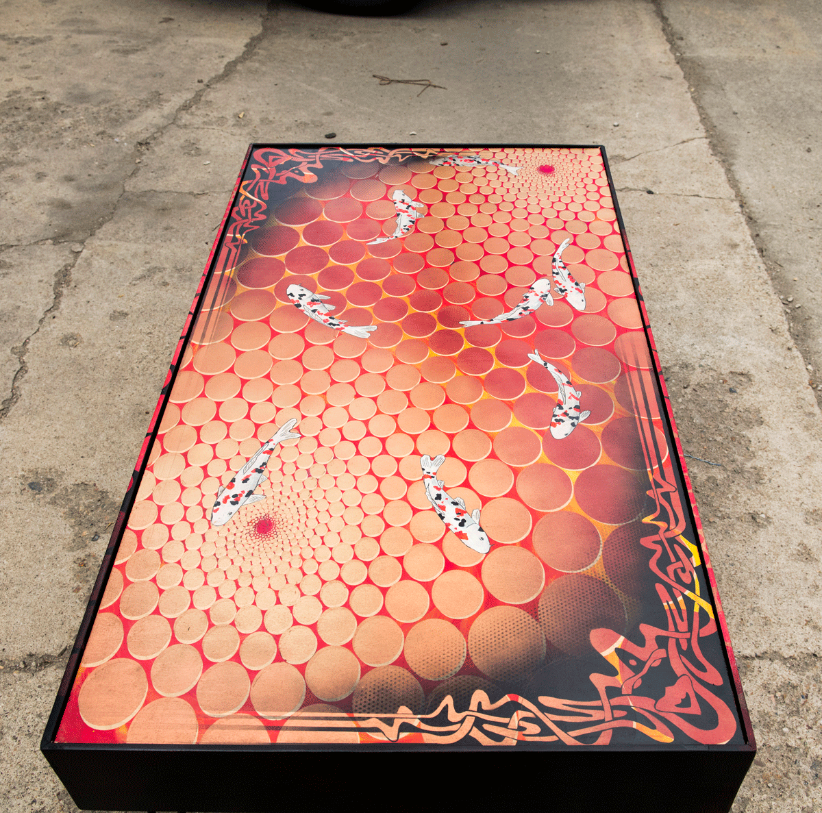  lavafish table  49"x27"x18"tall  mixed media on maple panel with steel hairpin legs. 